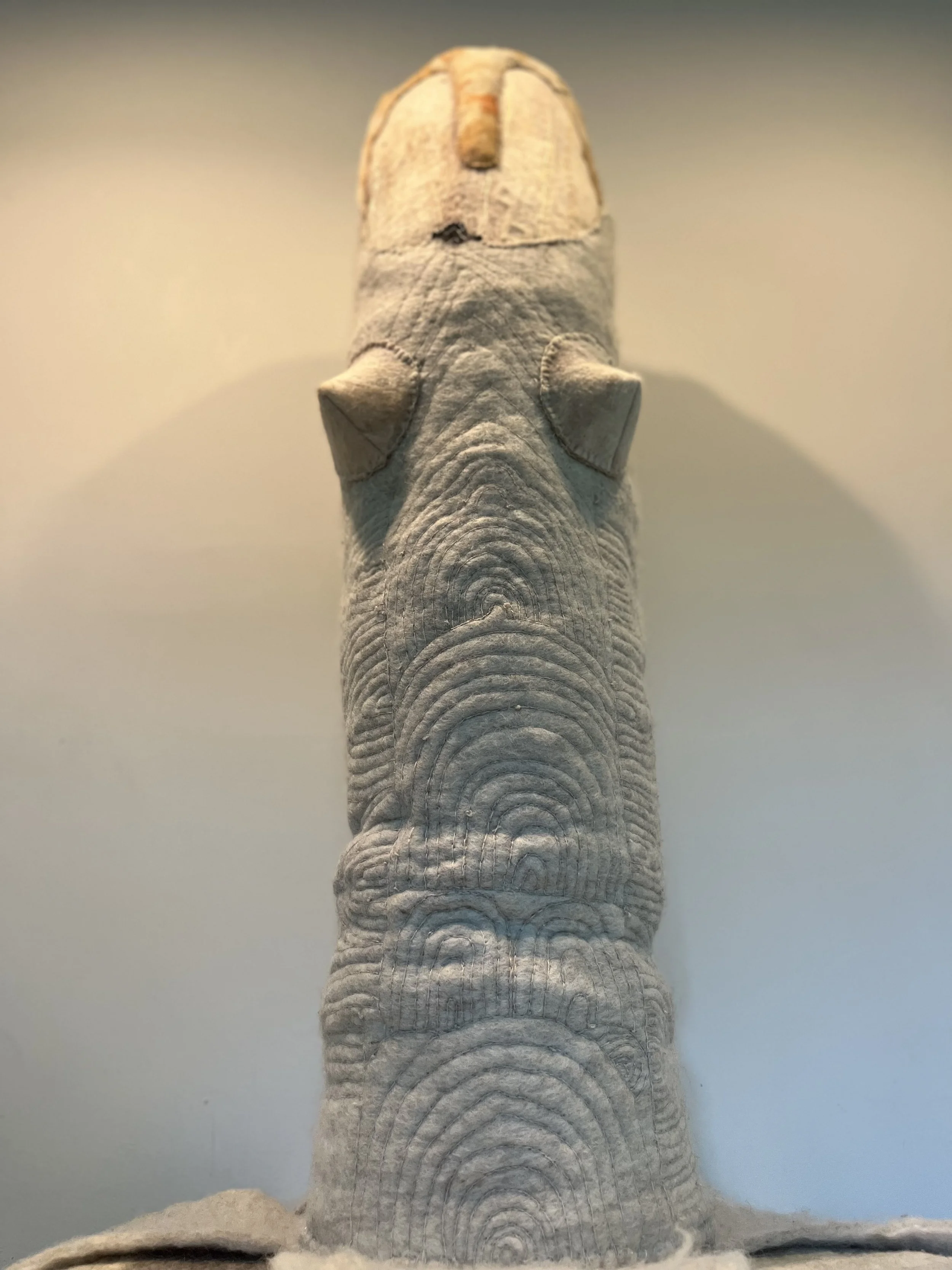 WE monolith Lady 2019/2025
wet felted wool, wire armature, hand stitching in linenhandspun wool sprang Hair
48"x 22" diameter
