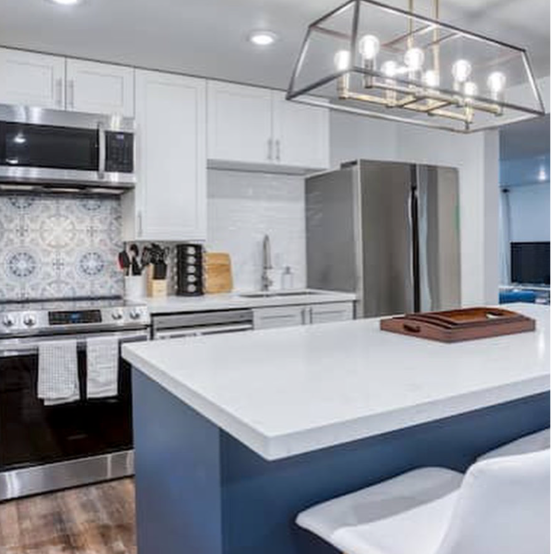 Modern kitchen renovation with custom cabinetry and island in Simcoe County.