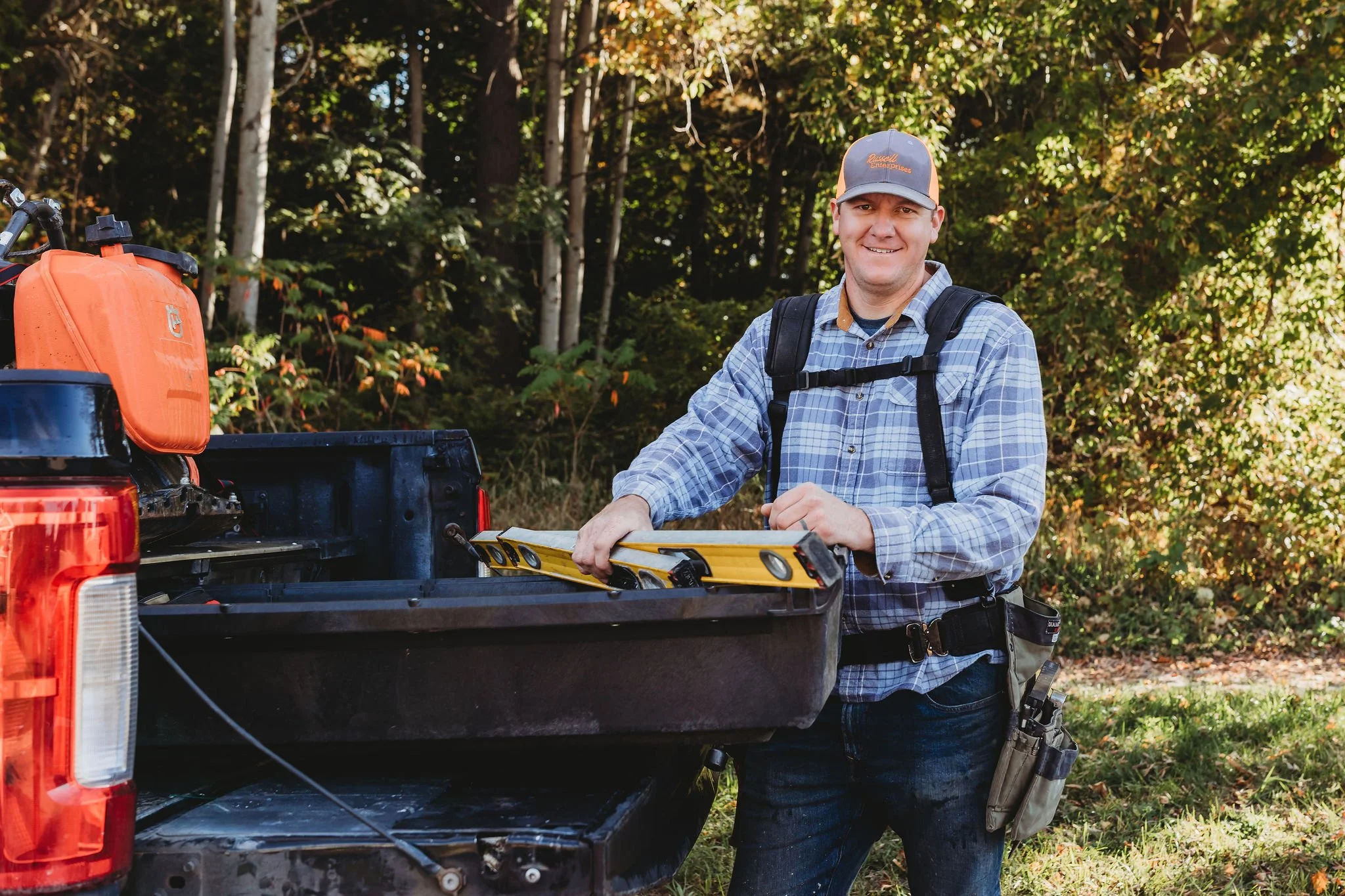 Josh Russell, owner of Russell Enterprises, preparing for a residential construction project.