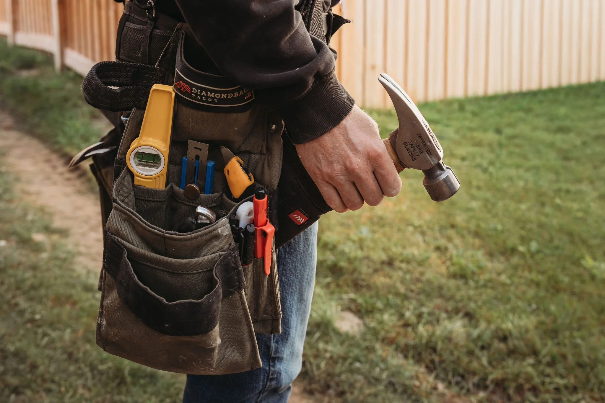 Contractor tool belt with essential tools ready for a residential construction project.
