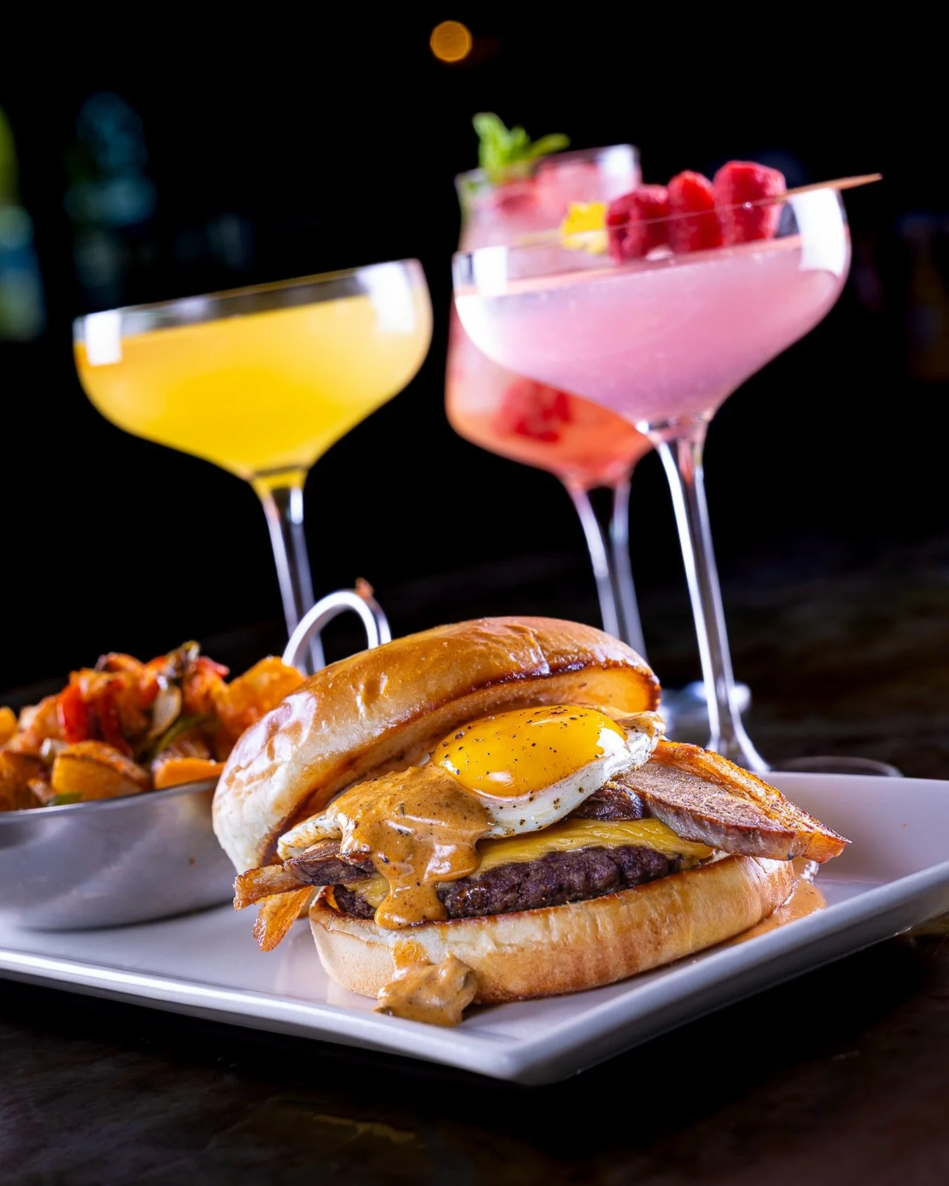 JOIN US FOR FOOTBALL AND BRUNCH EVERY SATURDAY &amp; SUNDAY FROM 930am-12pm

📸 BREAKFAST BURGER
Hamburger patty stacked with pork belly, egg, New School American cheese, and fry sauce

Served with a side of roasted rosemary potatoes
tossed with gril