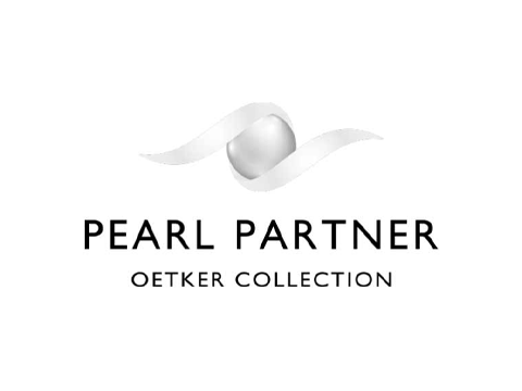 Logo for Pearl Partner Oetker Collection featuring a pearl with a flowing ribbon above the text.