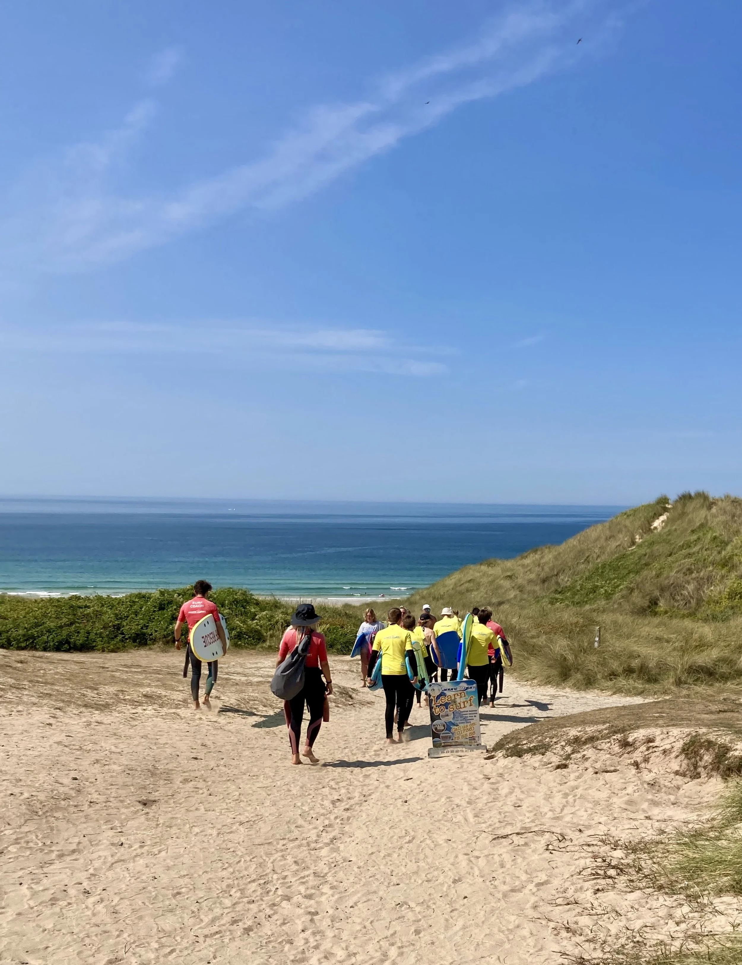 School group going for surf lesson