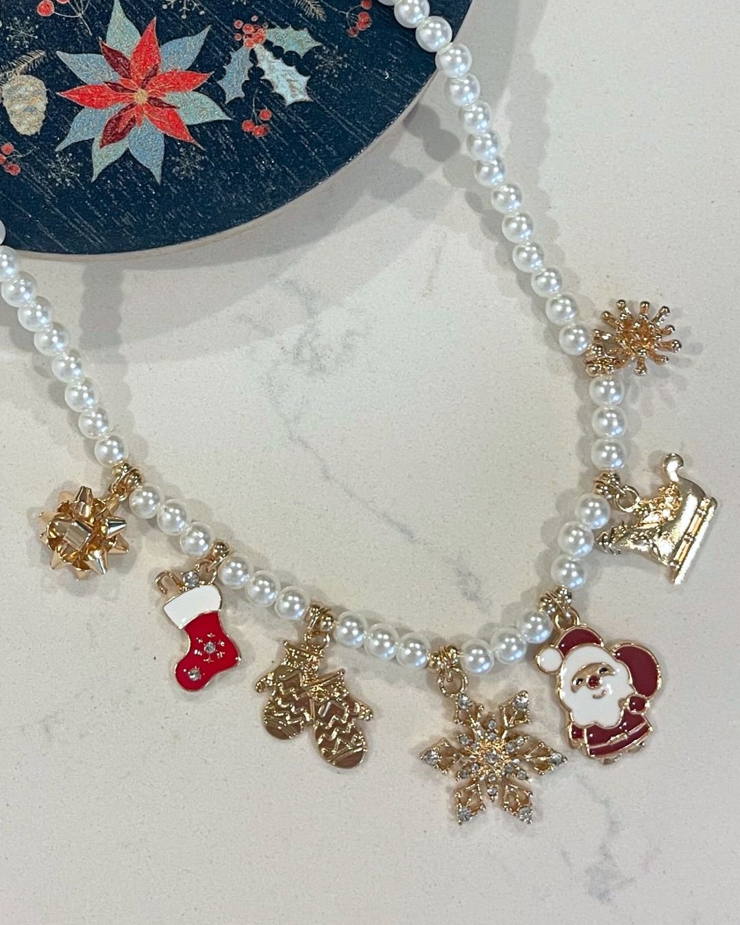 christmas-pearl-charm-necklace-tree-stocking-snowflake-candy-cane-rose-and-kate.jpg