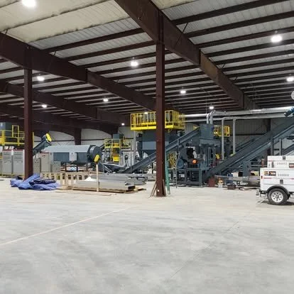 Millwrights installing new recycling lines at their new plant all while assisting with maintenance at their other location. Duct work by Western Blowpipe (2023)