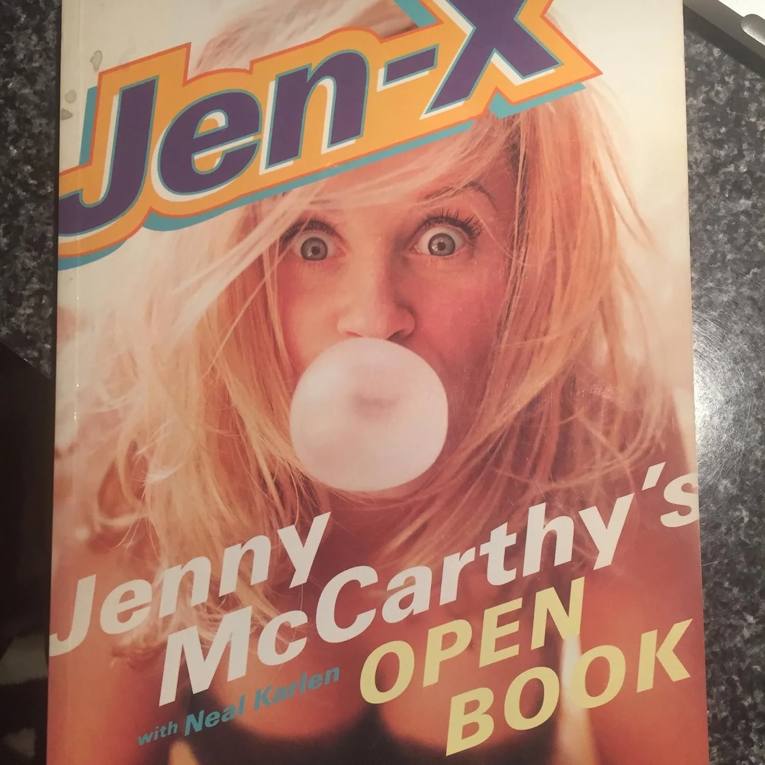 Jen-X: A candid autobiography covering McCarthy’s early life, career rise, personal experiences, and behind-the-scenes stories from her time as a model and television personality.