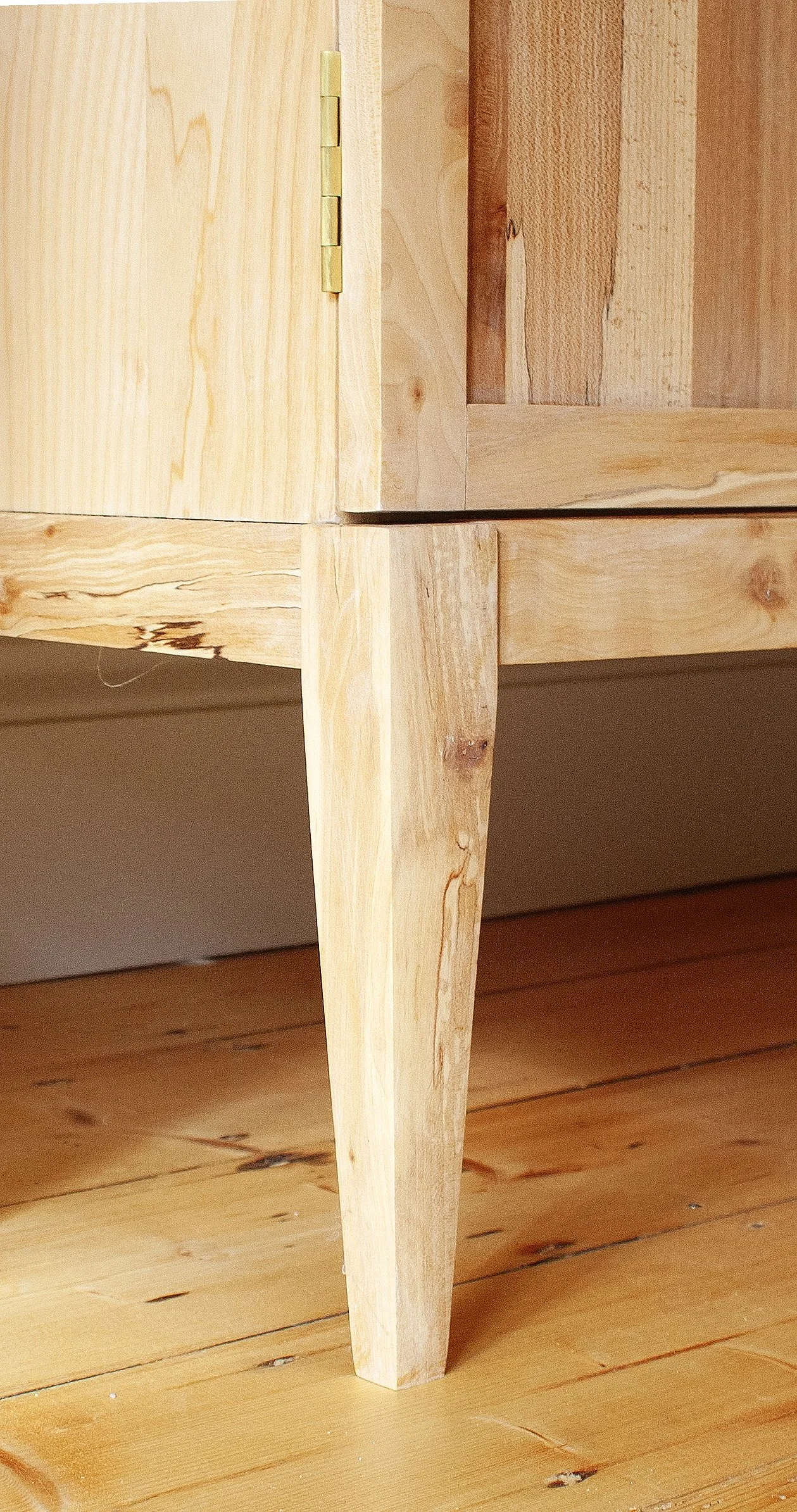 Detail of a bespoke commissioned solid wood cabinet
