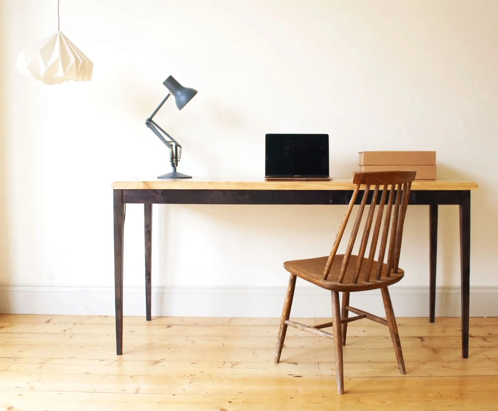 The Calder table; tapered elegant black stained leg frame with a solid oak spalted silver birch top