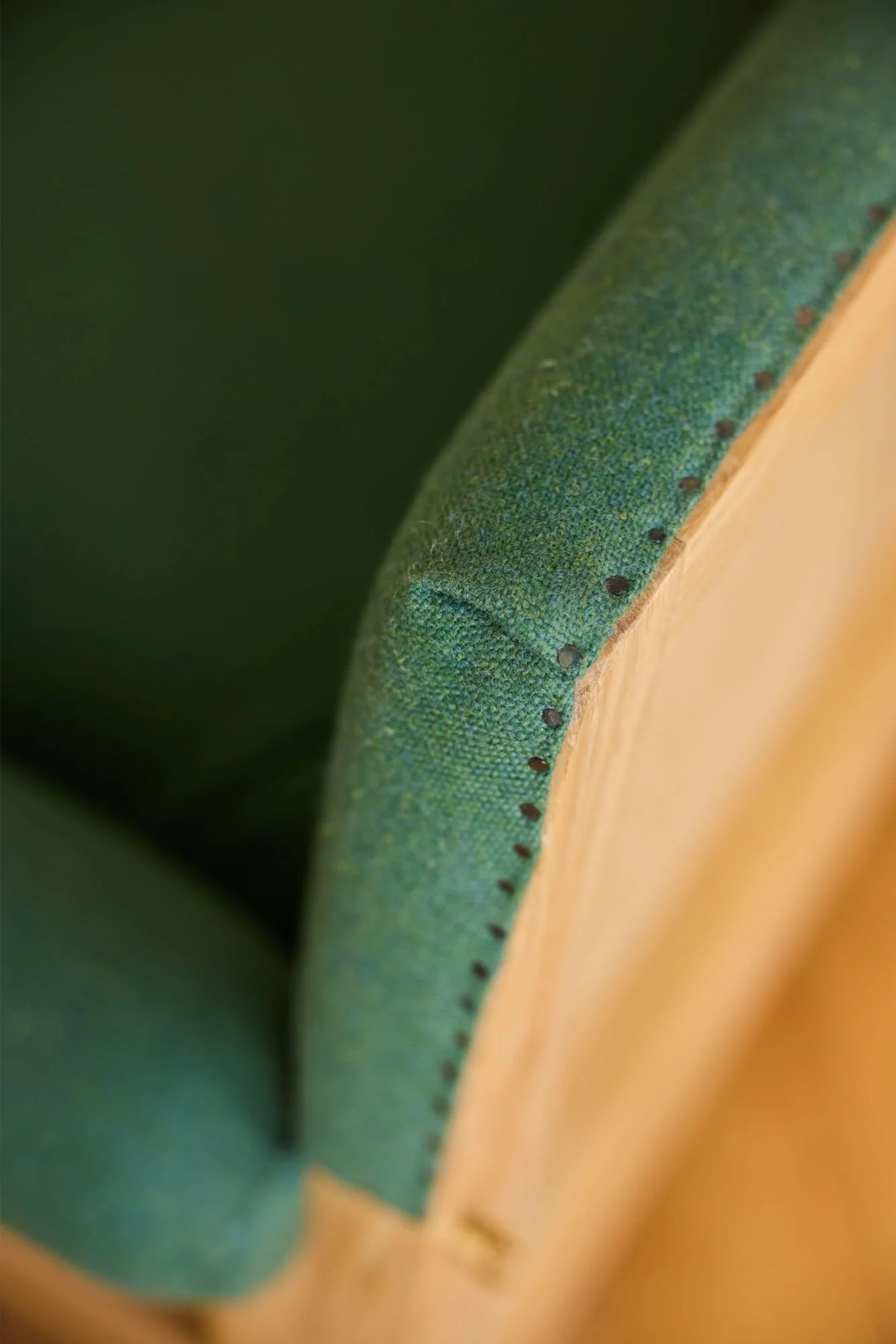 Traditional upholstery tack detailing on a custom sofa by Trew and Bold
