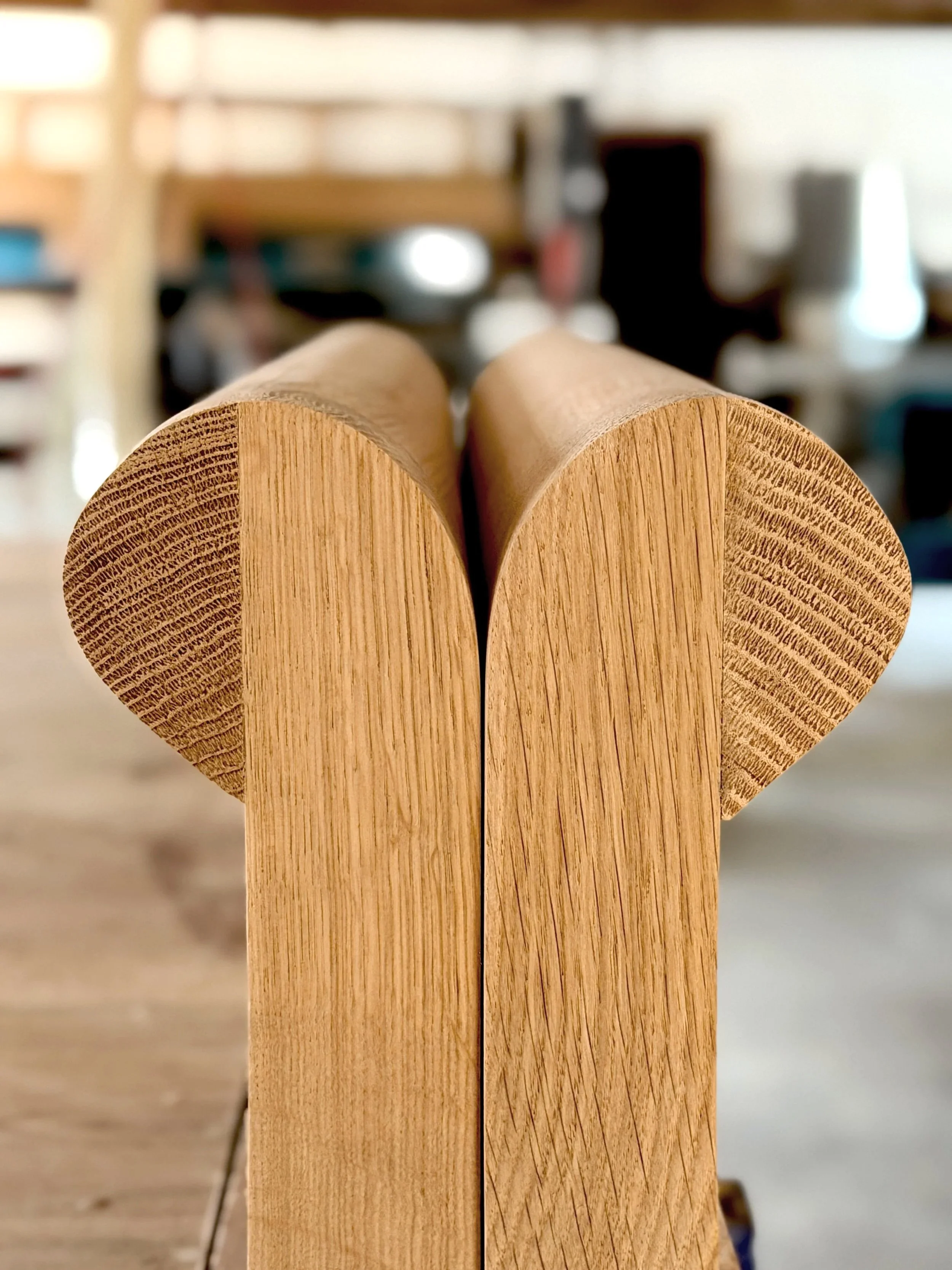 Close up of the hand finished oak arms of The Aldan in our workshop in Wick near the Cotswolds