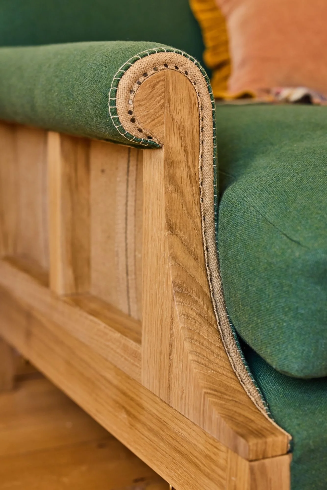 Detail of a scroll arm hand finished with spokeshaves and chisels in a workshop near the Cotswolds
