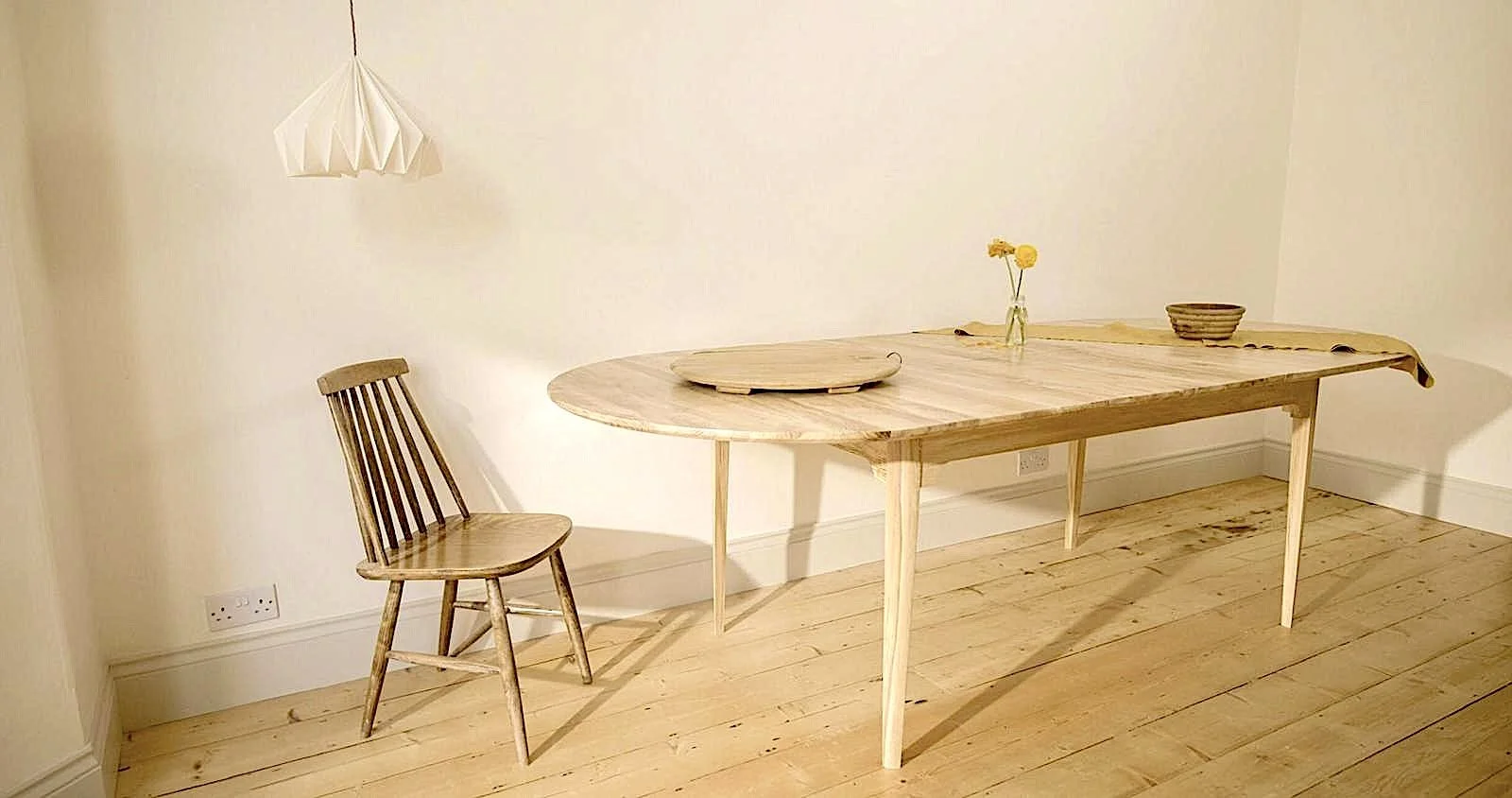 The Orwin Extending, a solid oak extendable dining table seating 10 people comfortably and 12 feeling cozy