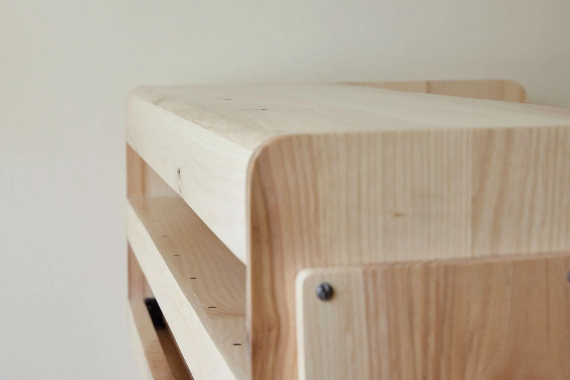 Detail of a mid-century inspired bespoke music production desk made using British ash
