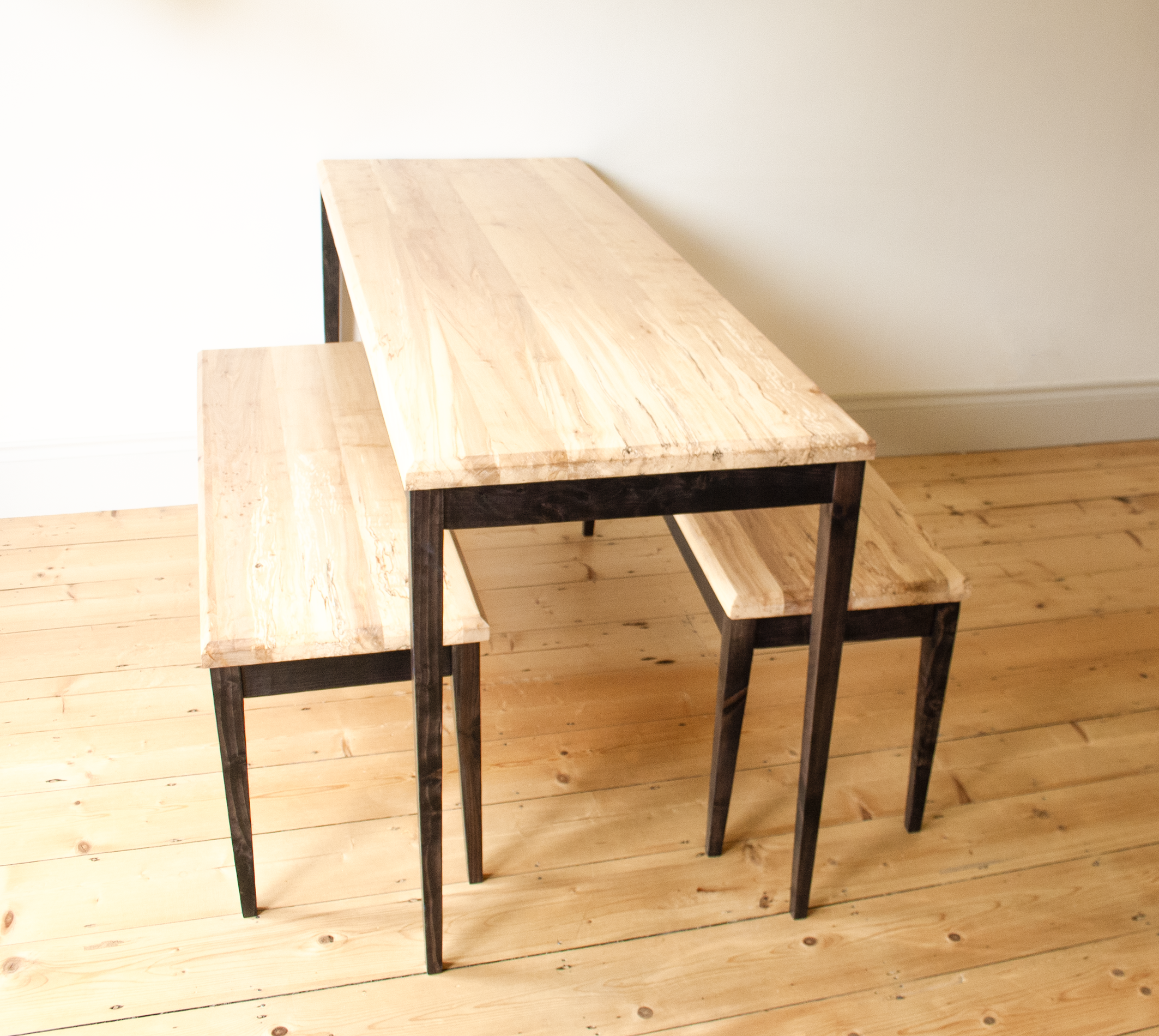 A shot of a The Calder Table and Benches a bespoke design made to fit an alcove in the Cotswolds