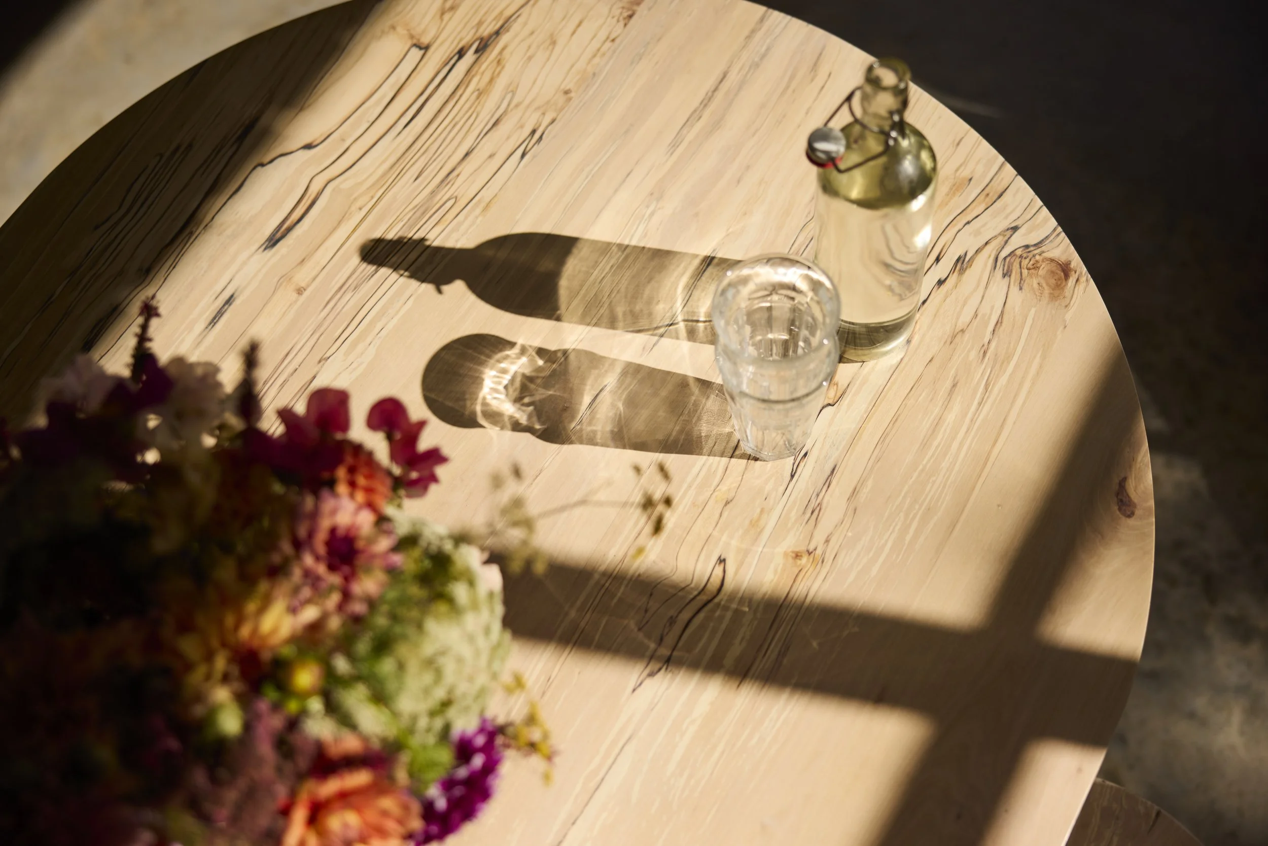 Close up of The Orwin Table made with striking spalted silver birch