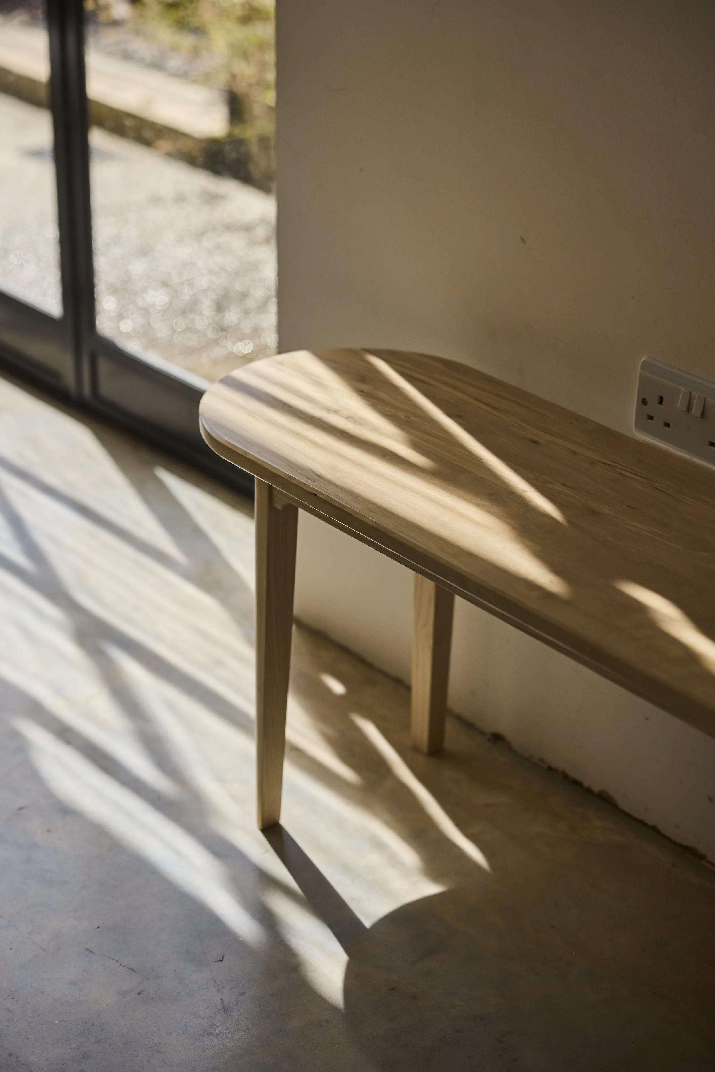 Abstract close up of solid wooden bench made from British timber