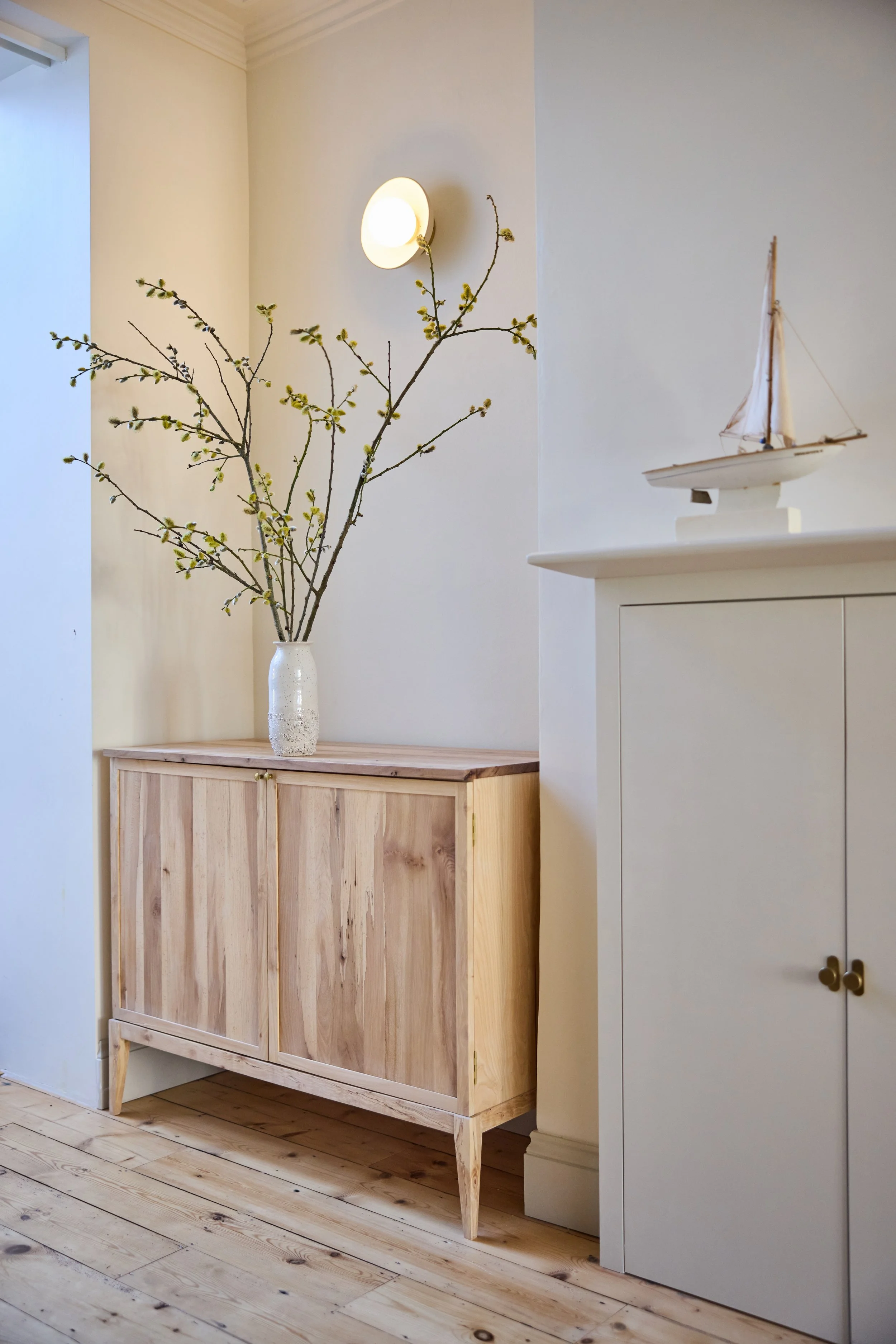 Bespoke Alcove cabinet designed with slim shaker doors and made from solid british hardwood