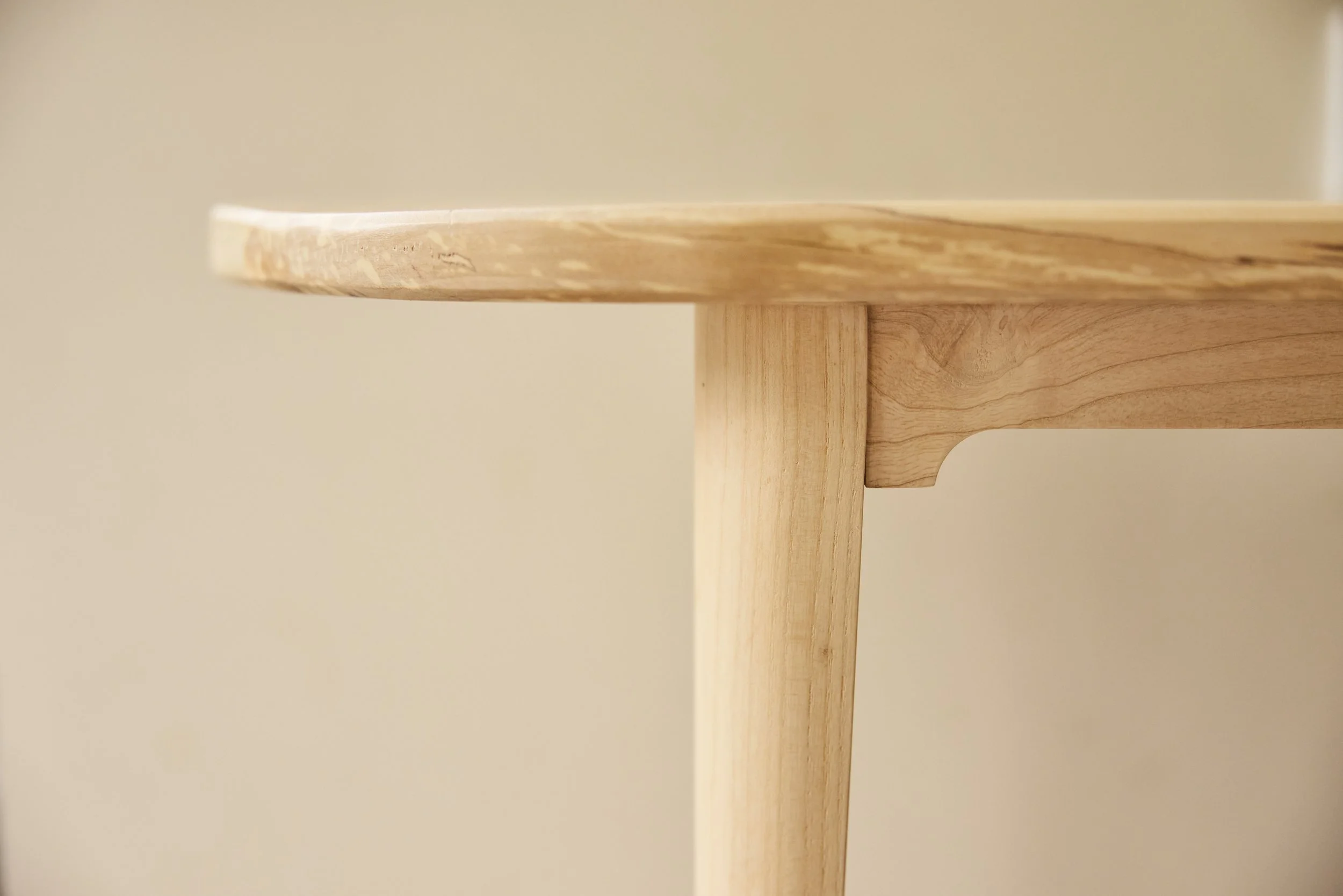 Detail of timber grain on a bespoke curved bench