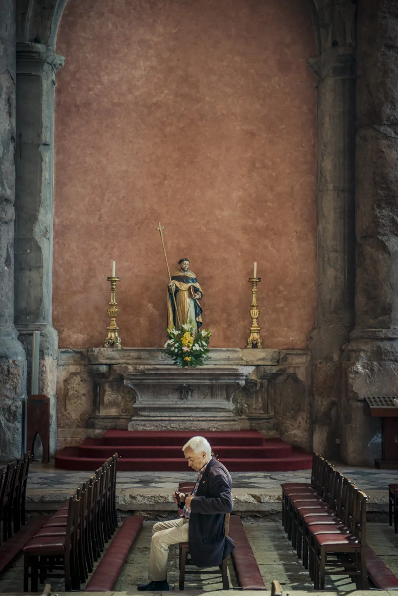 Praying.