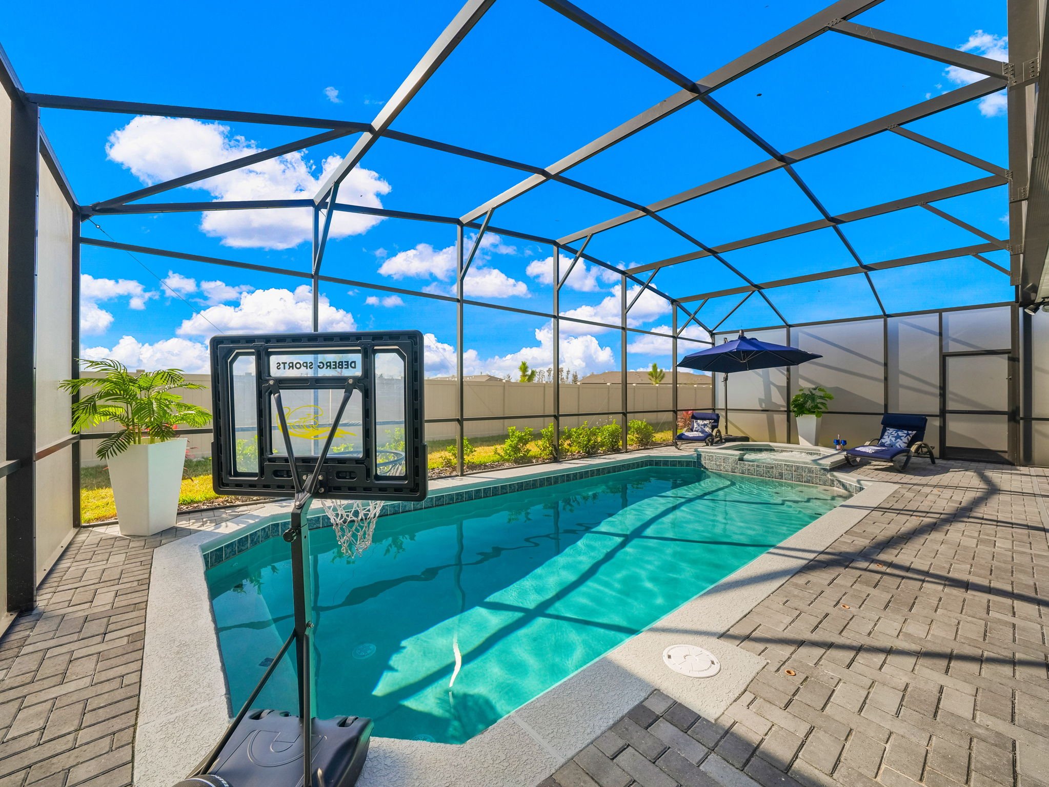 Relax by the private Pool and Spa at private villa in Windsor Cay Resort near Orlando, Disney, and Universal Studios. Enjoy sun and basketball at our vacation home, great for families and large parties, a 10-bedroom, 8-bath home with spacious living.