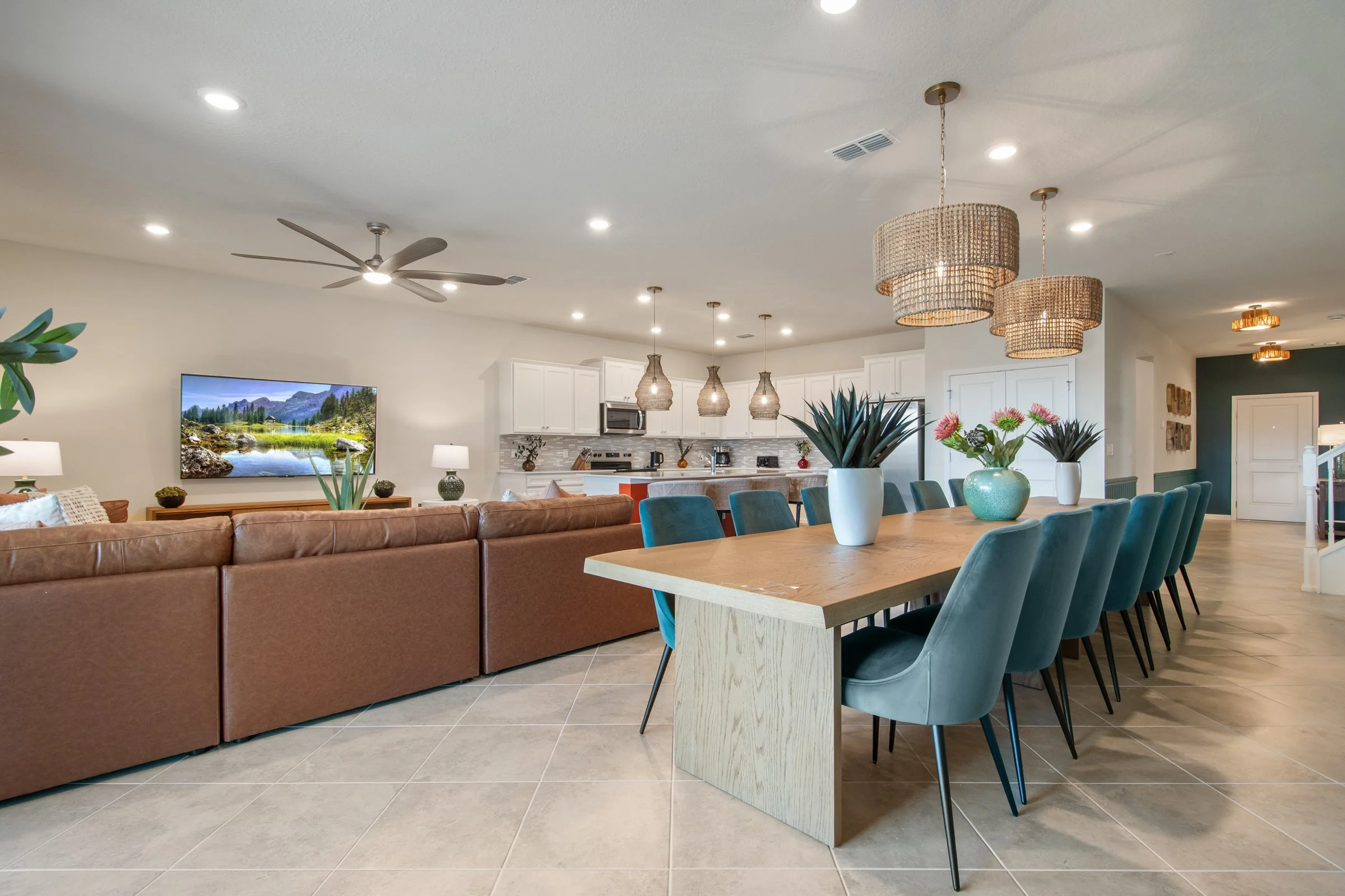 Spacious living and dining for large parties in a private villa in Windsor Cay Resort near Orlando, Disney, and Universal Studios. Family friendly; a 10-bedroom, 8-bath home with private pool and spa.