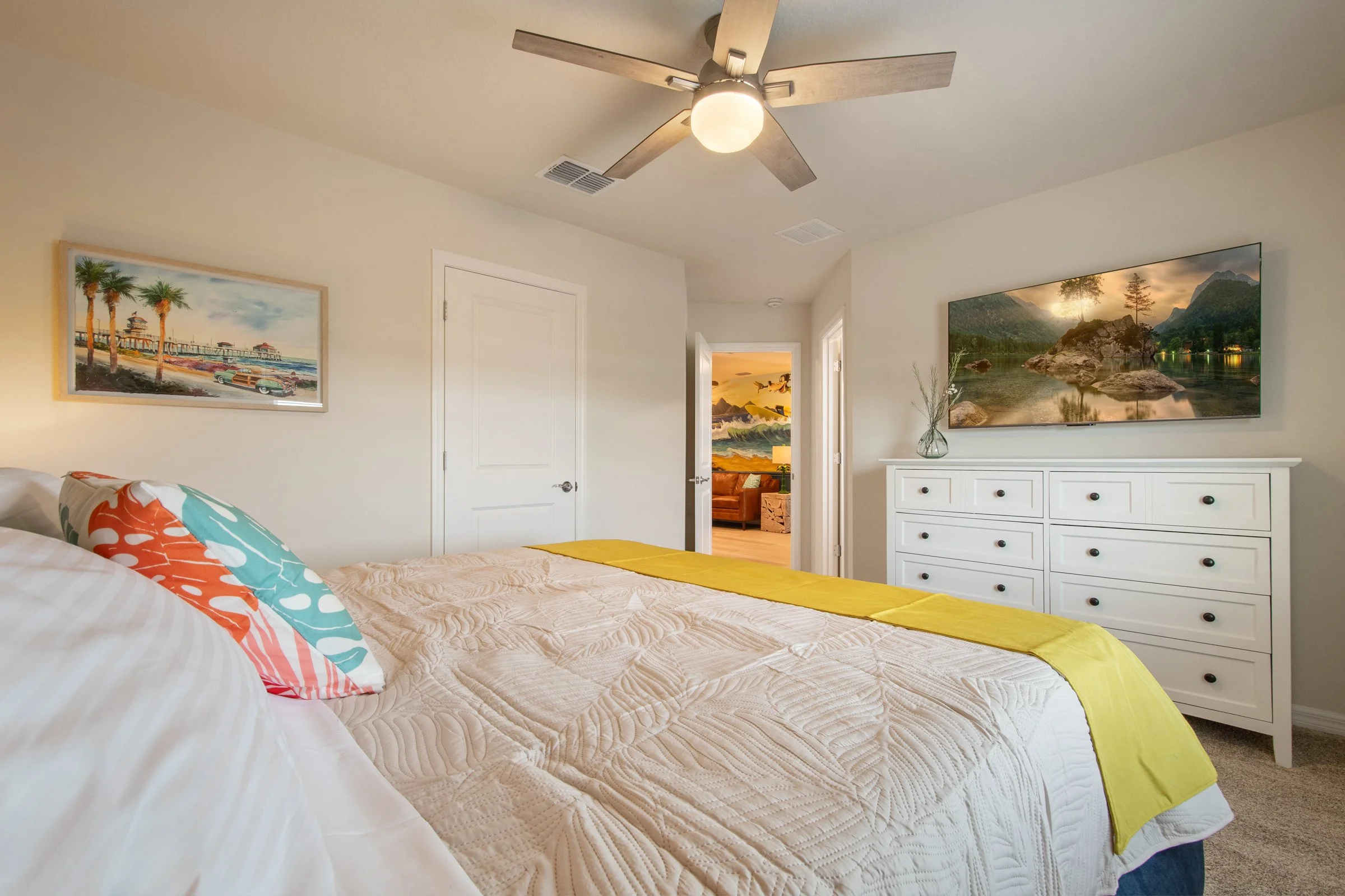 Luxury private villa in Windsor Cay Resort near Orlando, Disney, and Universal Studios. Tropical boho themed bedroom, TVs in every bedroom, spacious living, 10-bedroom, 8-bath home with private pool and spa.