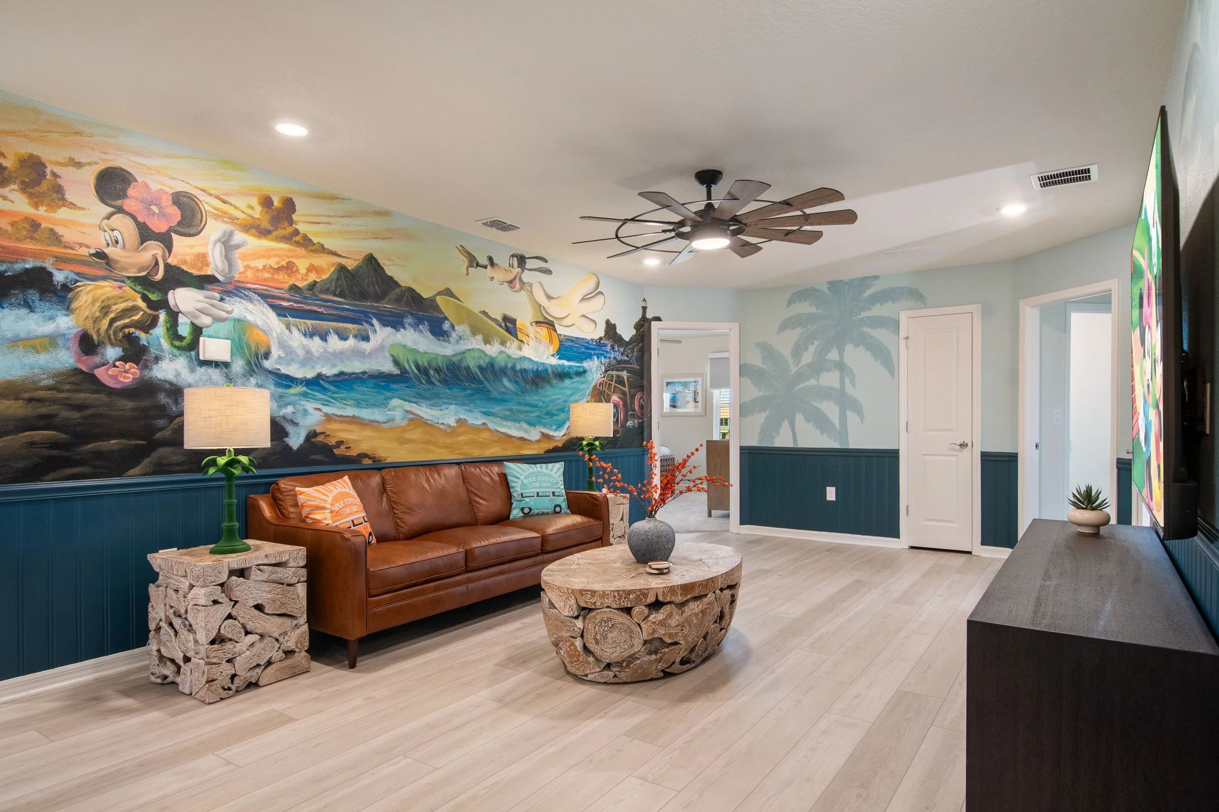 Family-friendly private villa in Windsor Cay Resort near Orlando, Disney, and Universal Studios. Mickey and Friends themed bonus room, Disney wall murals, spacious living, 10-bedroom, 8-bath home with private pool and spa.
