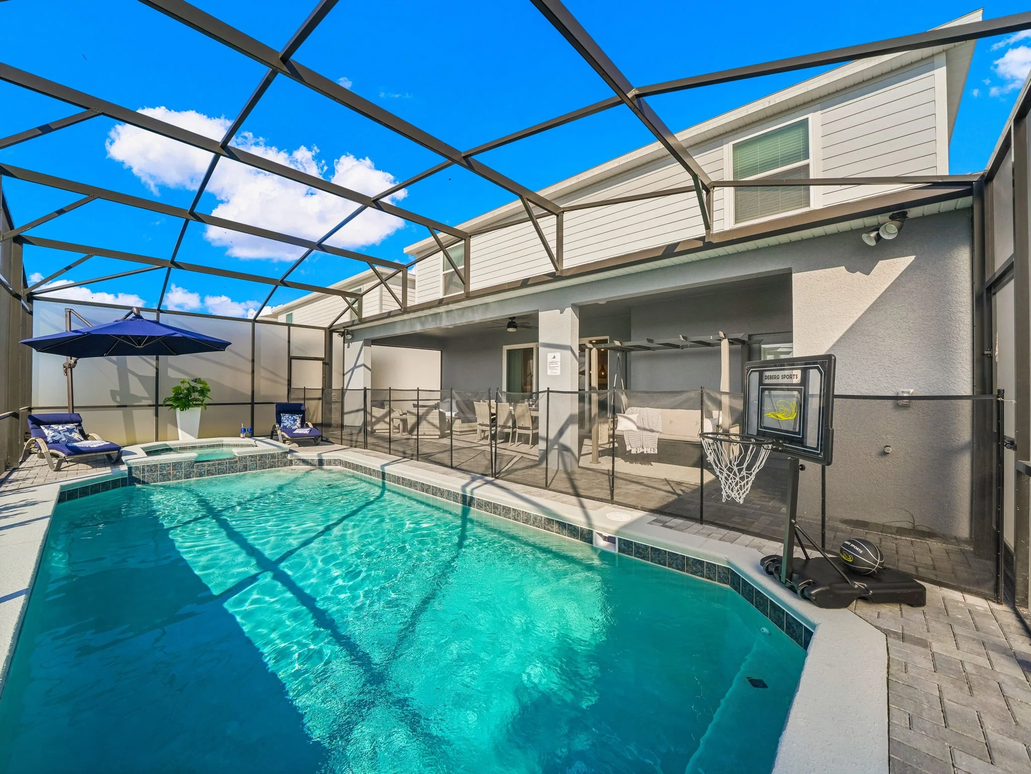 Relax by the private Pool and Spa at private villa in Windsor Cay Resort near Orlando, Disney, and Universal Studios. Enjoy sun and basketball at our vacation home, great for families and large parties, a 10-bedroom, 8-bath home with spacious living.