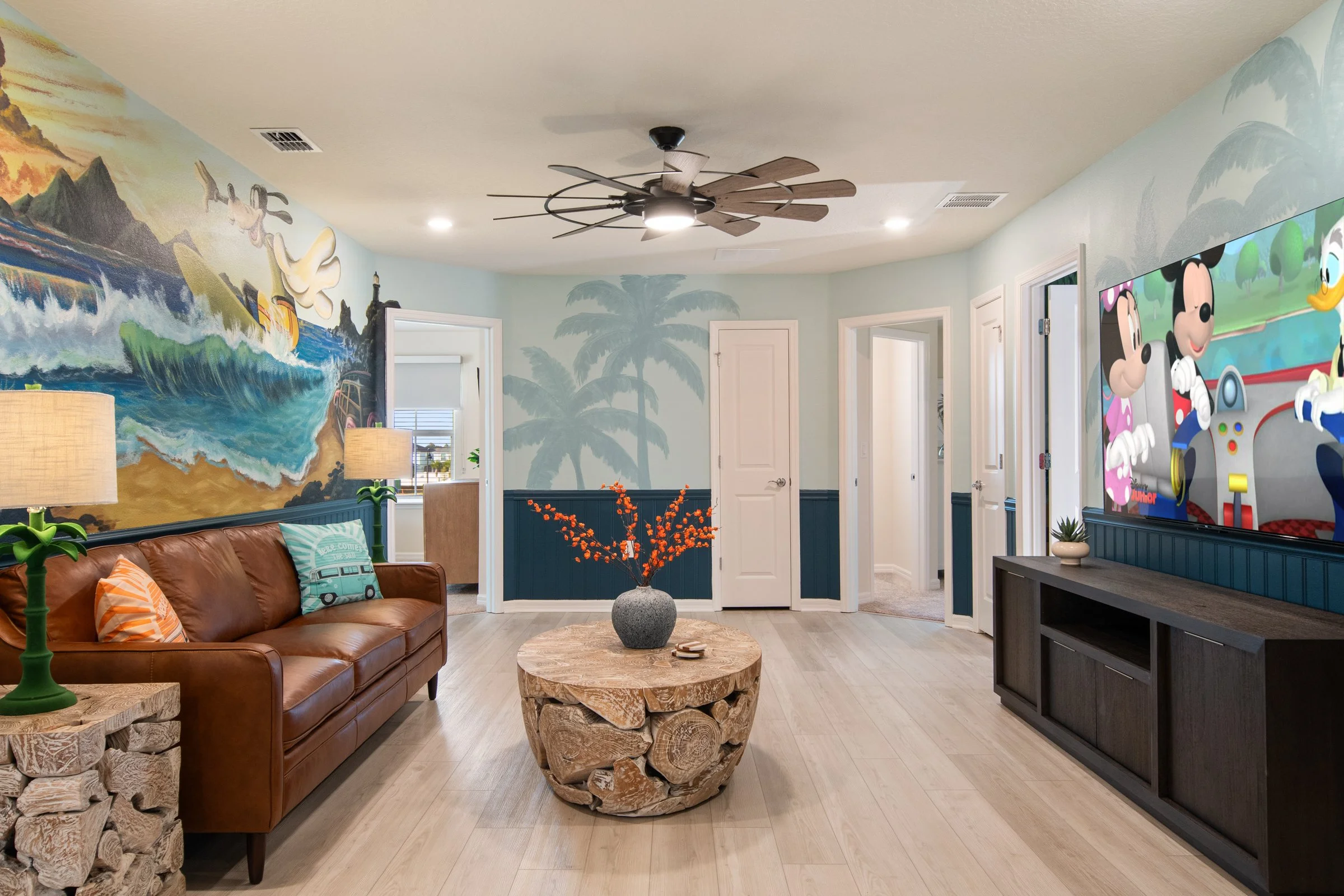 Family-friendly private villa in Windsor Cay Resort near Orlando, Disney, and Universal Studios. Mickey and Friends themed bonus room, wall murals, spacious living, 10-bedroom, 8-bath home with private pool and spa.