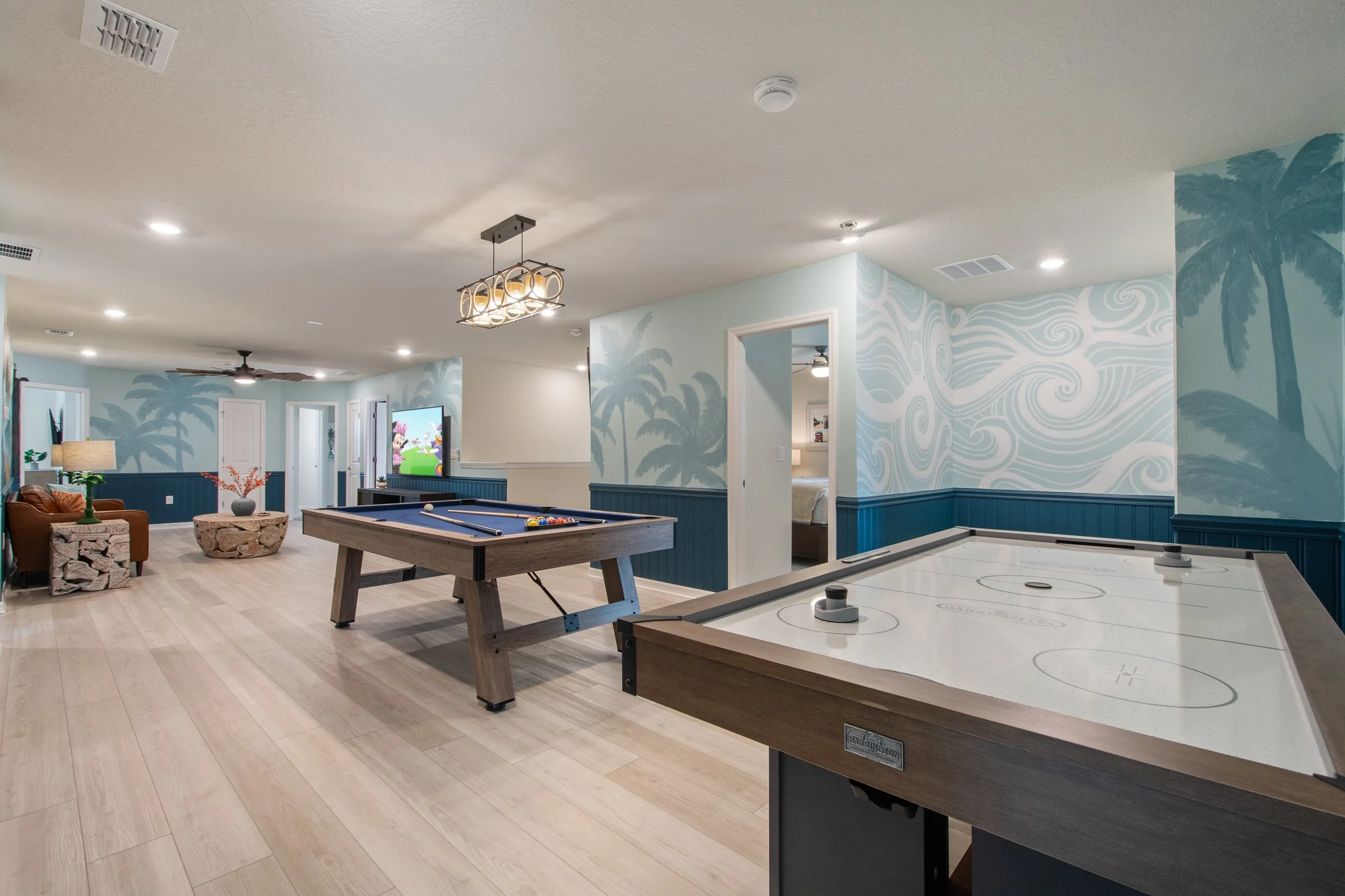 Family-friendly private villa in Windsor Cay Resort near Orlando, Disney, and Universal Studios. Mickey and Friends themed bonus room, game space, air hockey and pool table, spacious living, 10-bedroom, 8-bath home with private pool and spa.