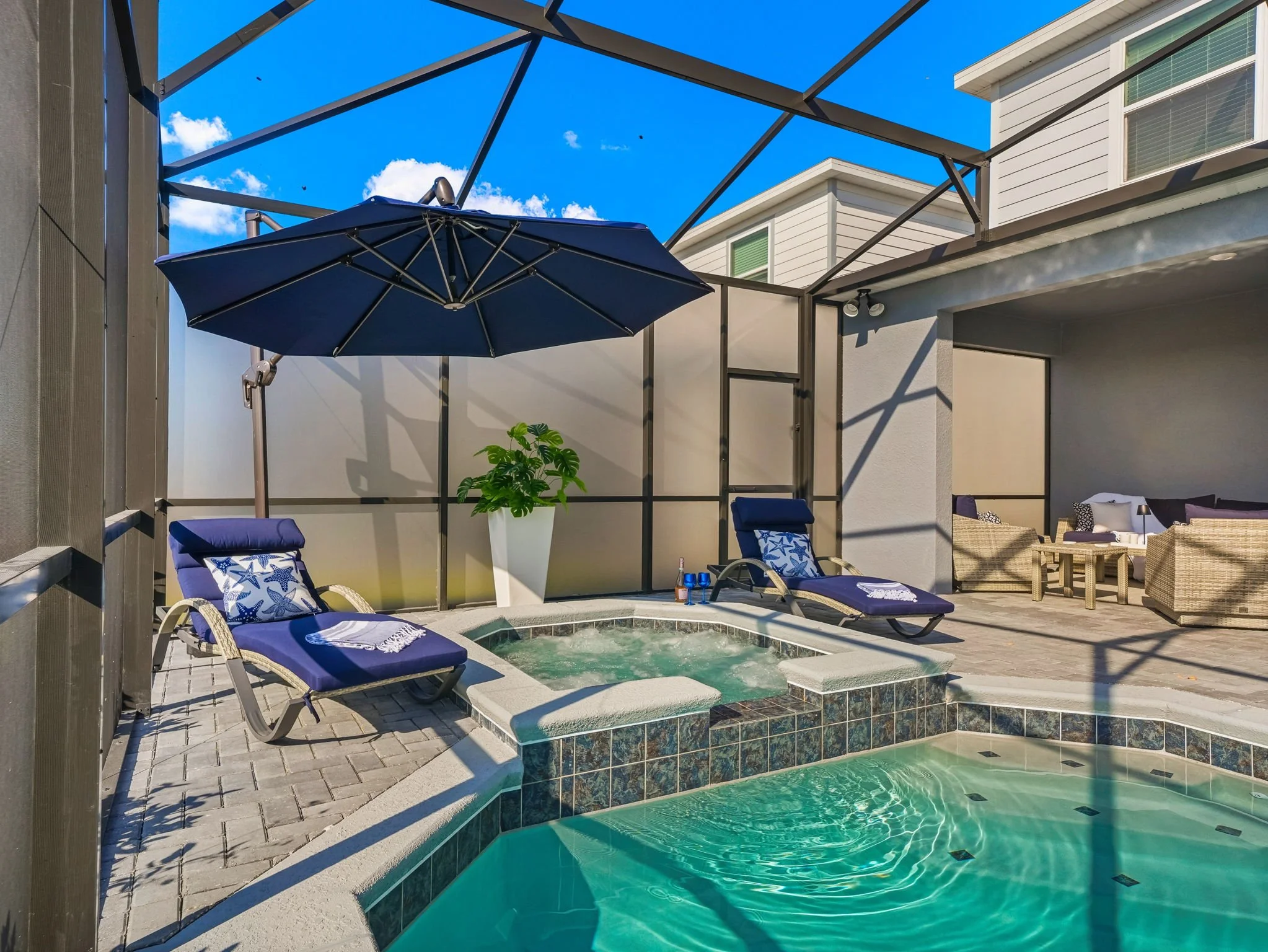Enjoy the private pool and hot tub at private villa in Windsor Cay Resort near Orlando, Disney, and Universal Studios. Lounge by the pool at our vacation home, great for families and large parties, a 10-bedroom, 8-bath home with spacious living.
