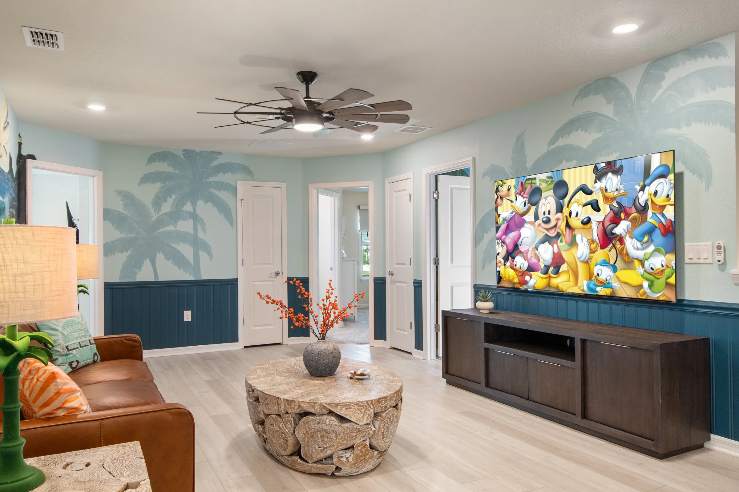 Family-friendly private villa in Windsor Cay Resort near Orlando, Disney, and Universal Studios. Mickey and Friends themed bonus room, Disney wall murals, TVs in every room, spacious living, 10-bedroom, 8-bath home with private pool and spa.