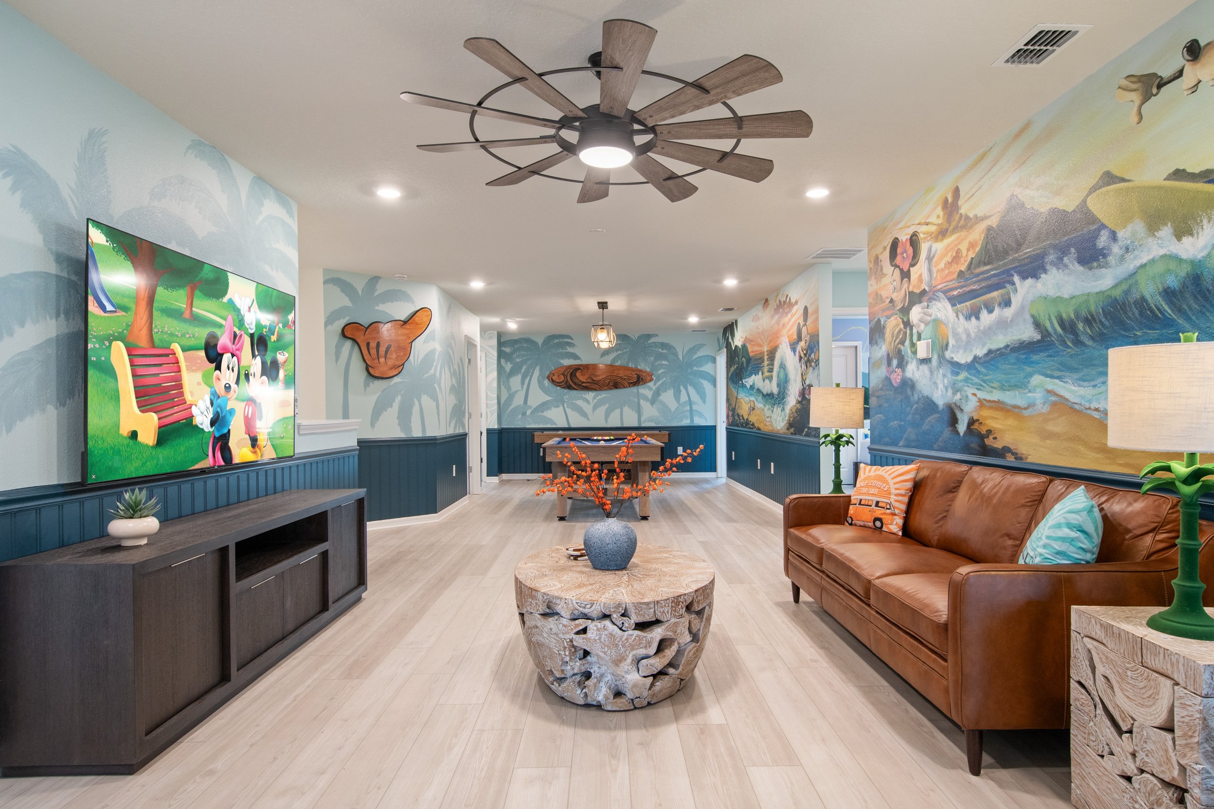 Kid-friendly private villa in Windsor Cay Resort near Orlando, Disney, and Universal Studios. Mickey and Friends themed bonus room, Disney wall murals, TVs in every room, spacious living, 10-bedroom, 8-bath home with private pool and spa.