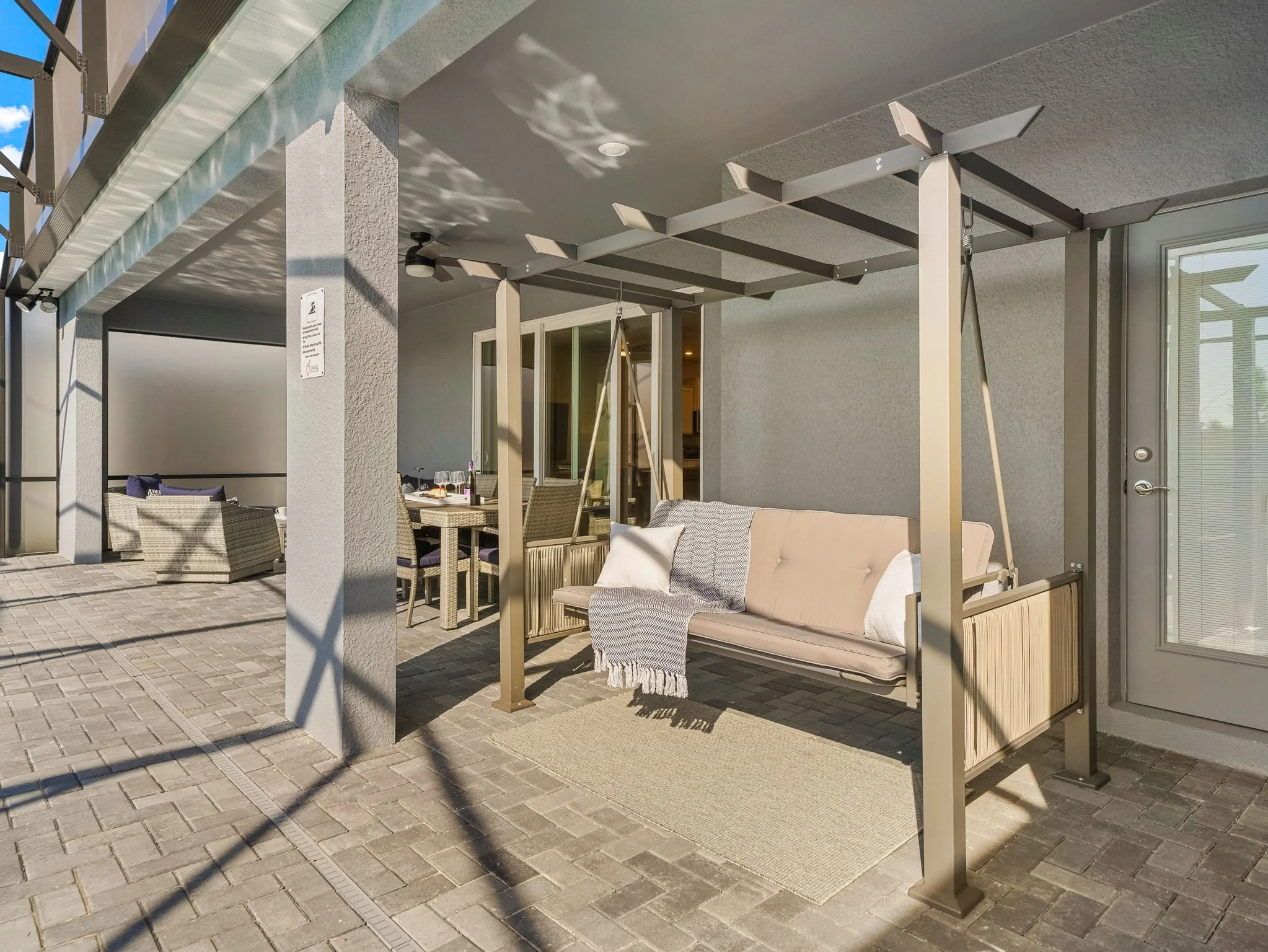 Lounge, swing, dine or visit on the patio at this private villa in Windsor Cay Resort near Orlando, Disney, and Universal Studios. Great for families and large parties, a 10-bedroom, 8-bath home with spacious living.