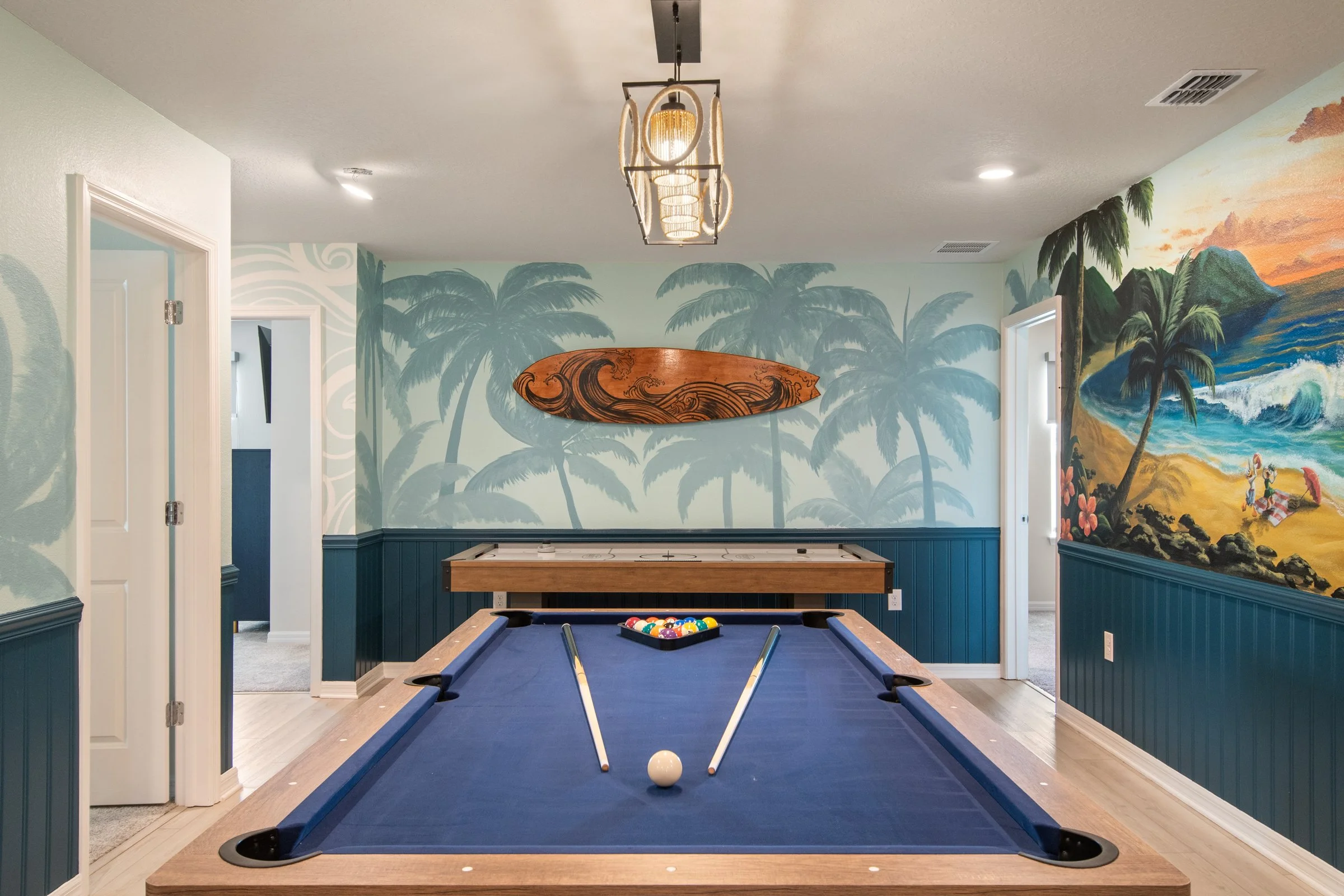 Family-friendly private villa in Windsor Cay Resort near Orlando, Disney, and Universal Studios. Mickey and Friends themed bonus room, wall murals, game space, air hockey and pool table, spacious living, 10-bedroom, 8-bath home with private pool and 