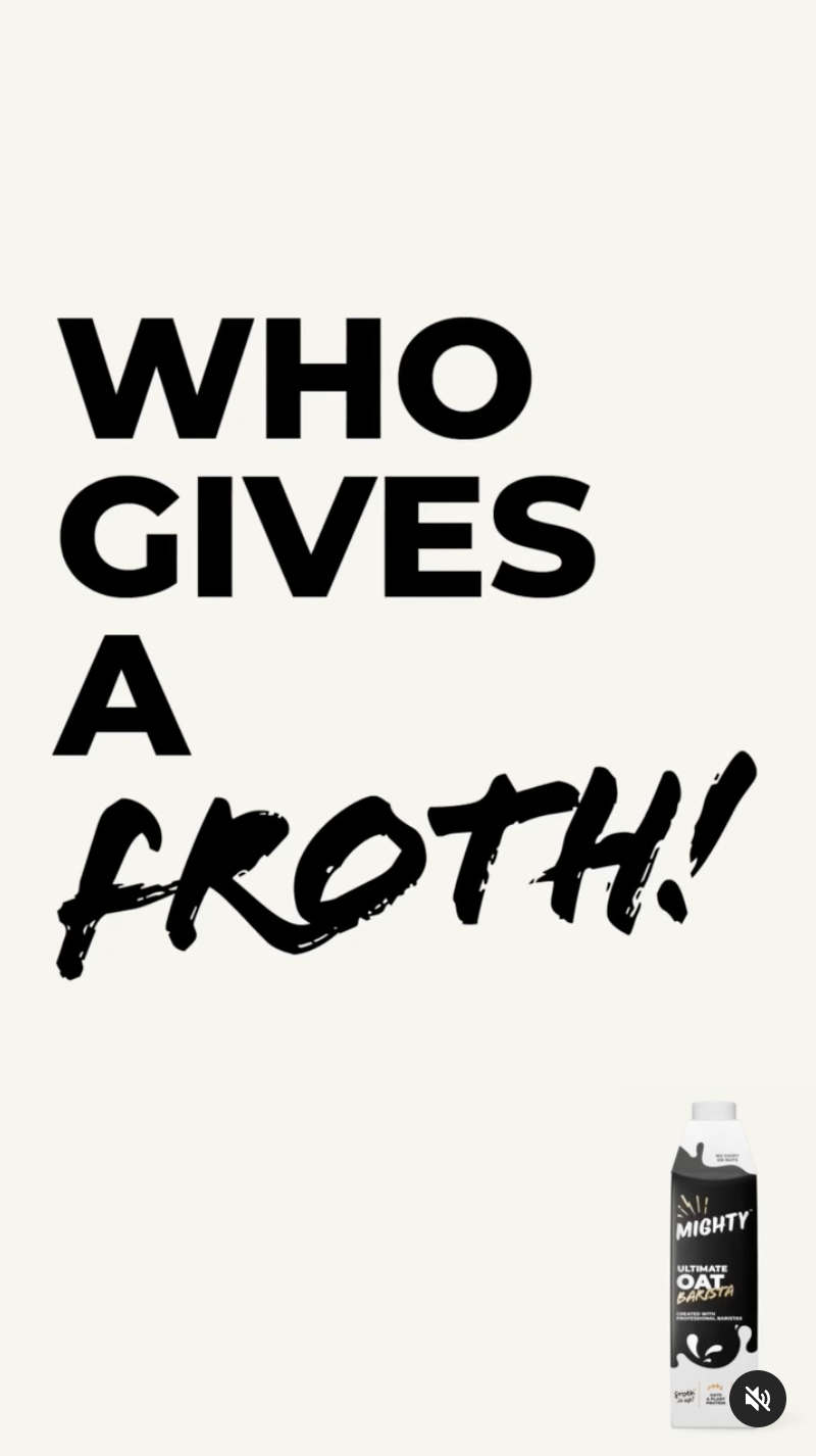 Text in bold black letters on a light background reads: "WHO GIVES A FROTH!" in large font. In the bottom right corner, there is a carton of oat milk labeled "MIGHTY ULTIMATE OAT BARISTA."