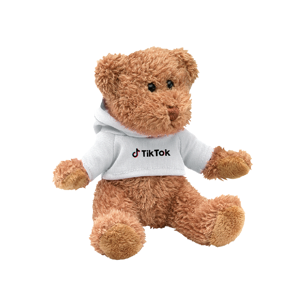 A plush teddy bear wearing a white hoodie with a TikTok logo.