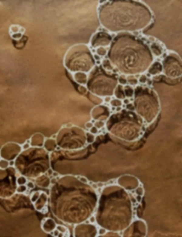 Soap bubbles on a wooden surface.