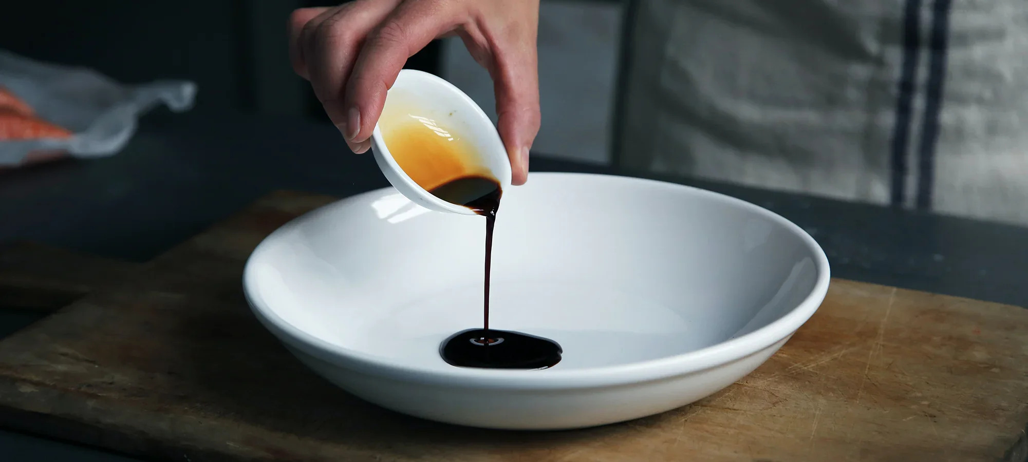 Artisan balsamic vinegar is poured for tasting at a shop in the Sedona Center.