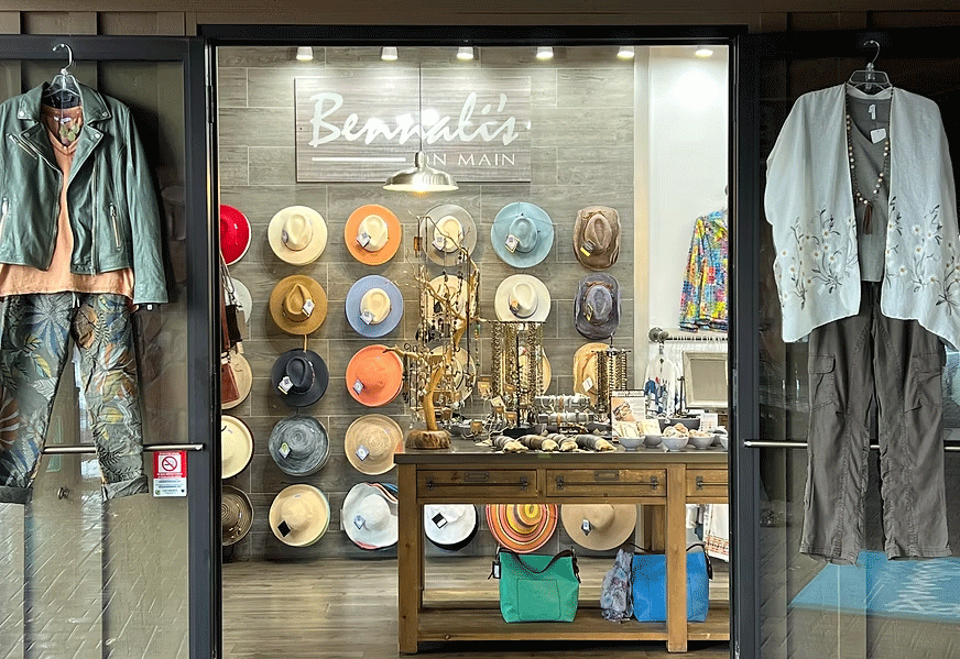A display of hats and outfits at a shop in the Sedona Center.