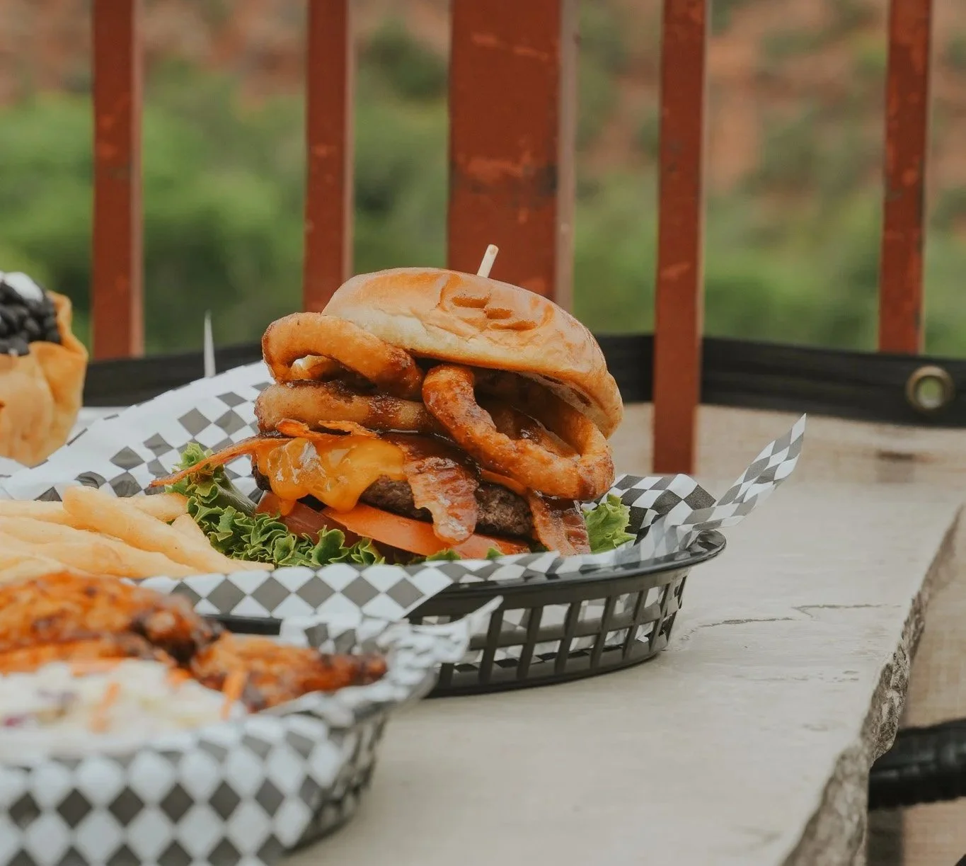 The Cowboy Burger on a patio table.