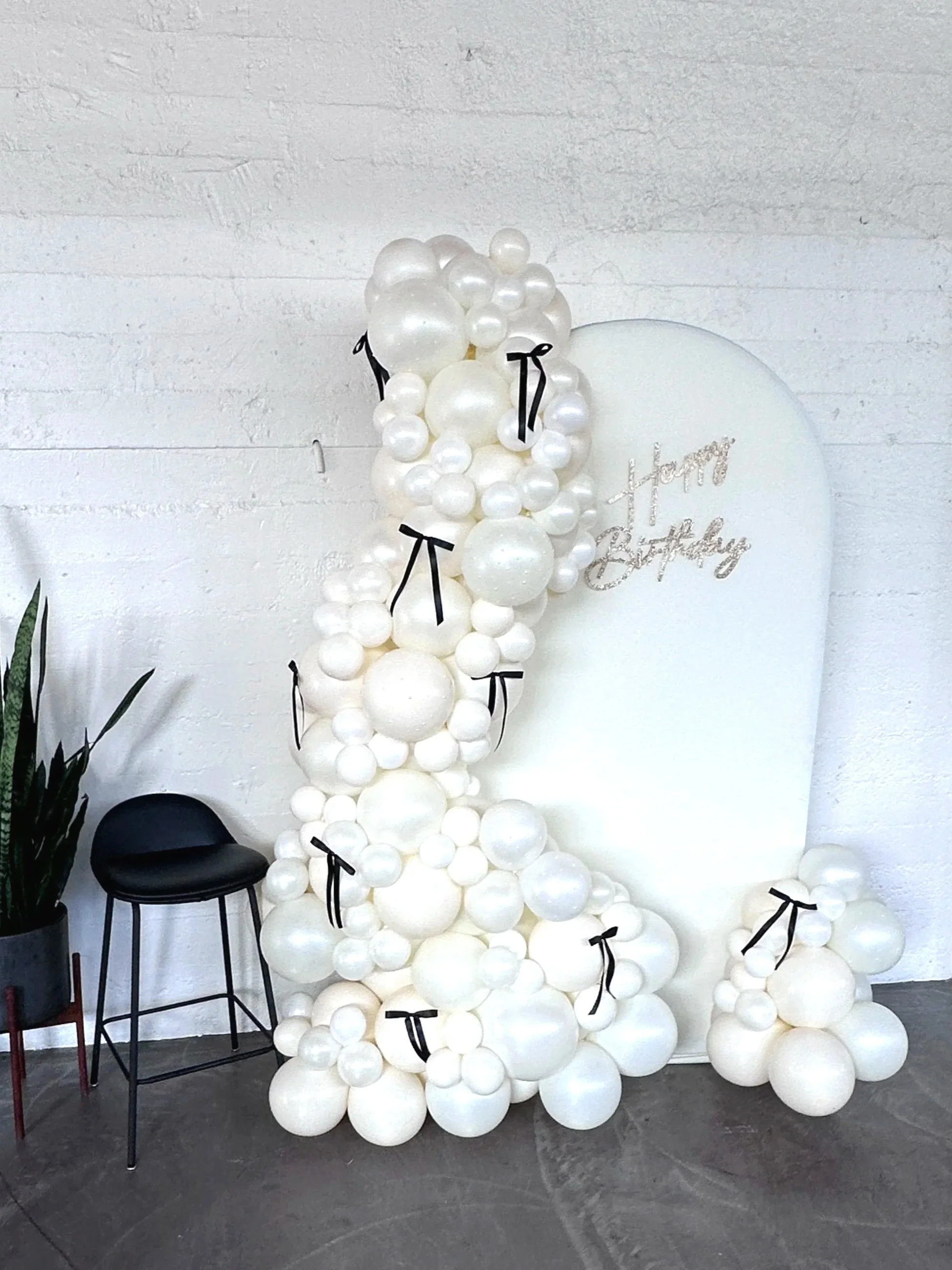 Chic White Balloon Décor with Black Ribbons | Birthday Styling Bay Area