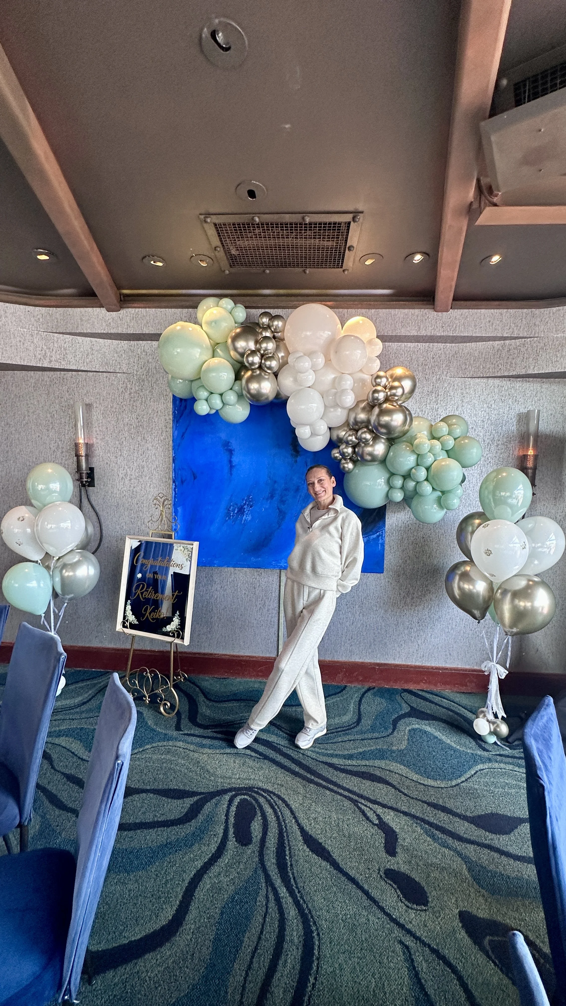 Retirement Celebration in San Mateo | Mint, ivory and gold balloon decor.