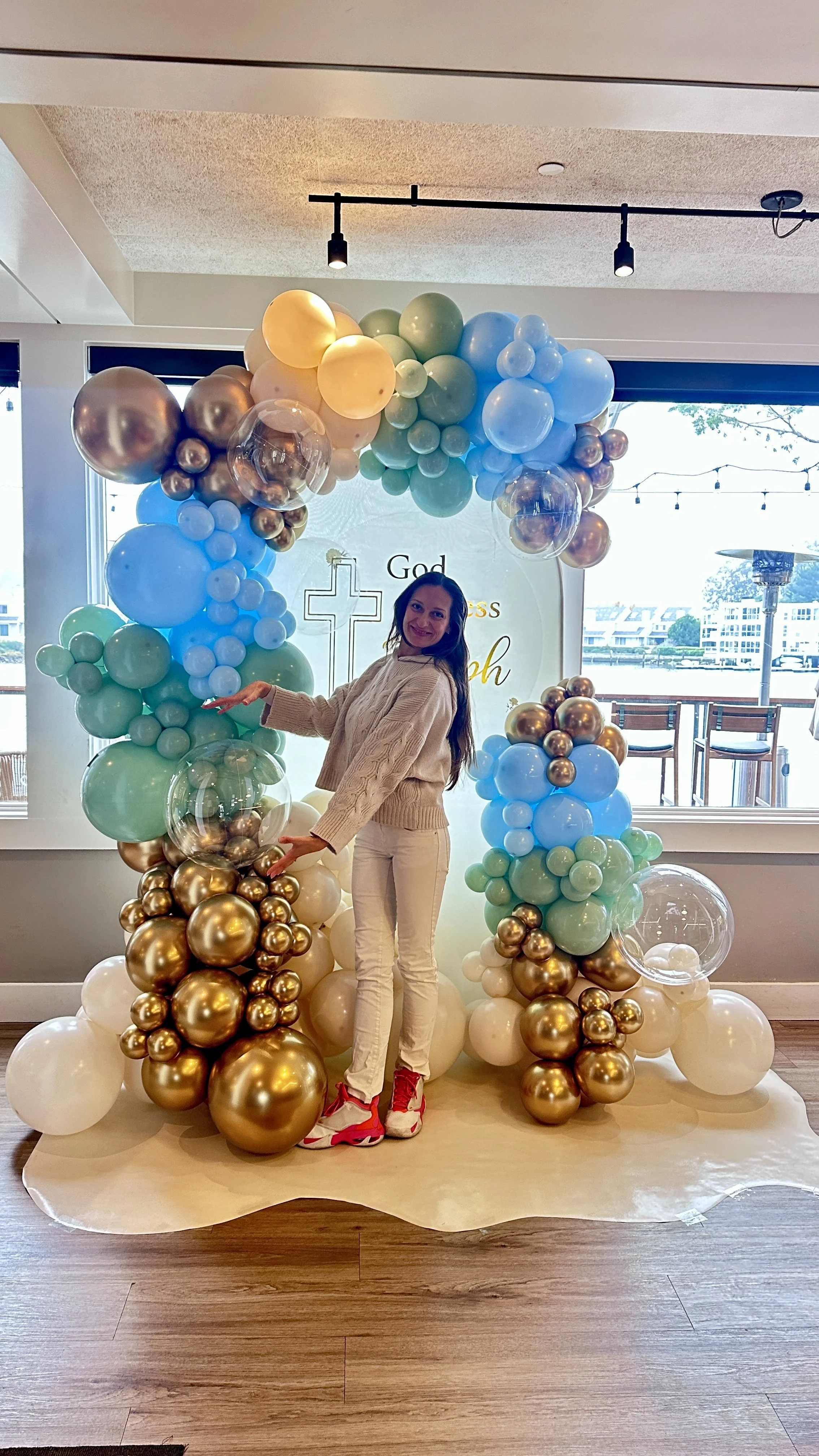 Baptism Celebration in Sonoma | Blue, mint, ivory and gold balloon backdrop.