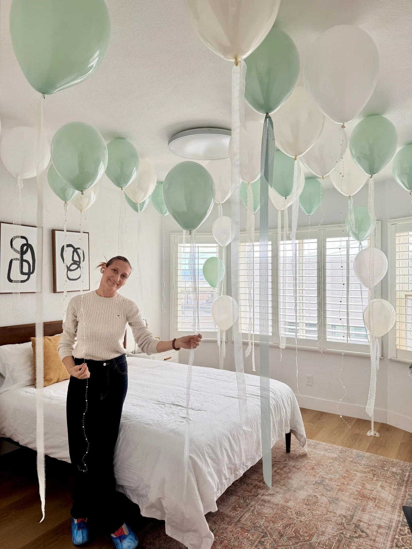 Bridal Celebration Balloon Decor in San Francisco | Mint and white ceiling balloons.