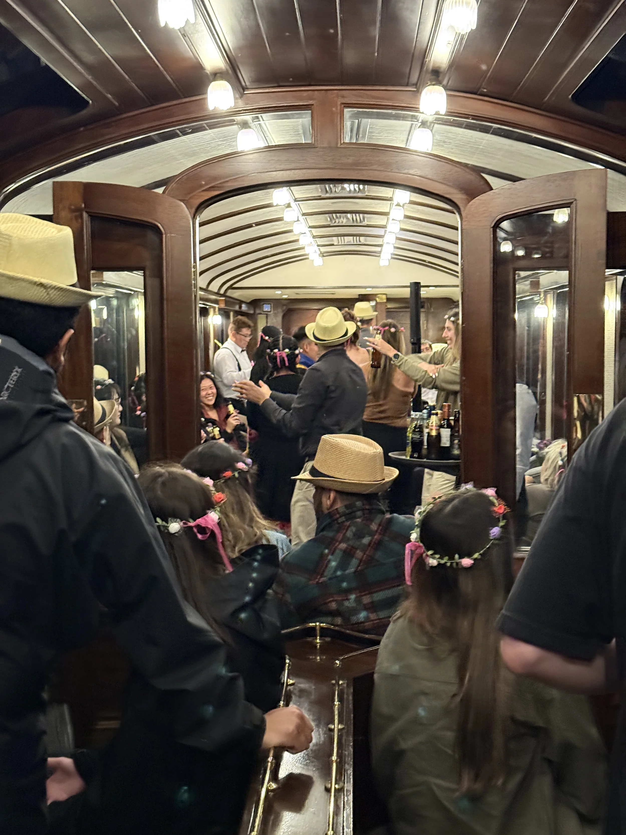 train in Peru dancing live music travelers