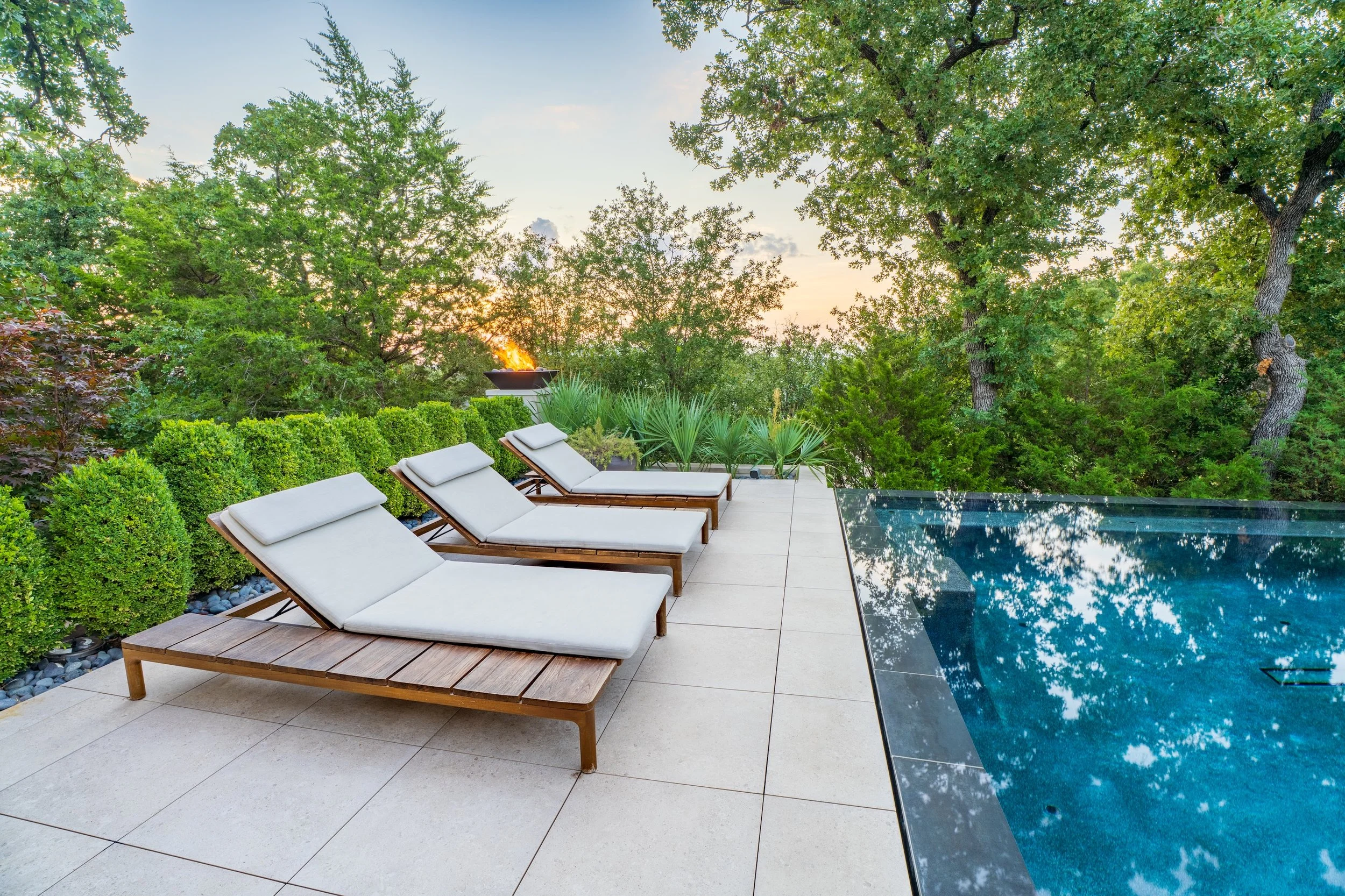 loungers by custom pool and spa by custom swimming pool builder in Westlake, TX