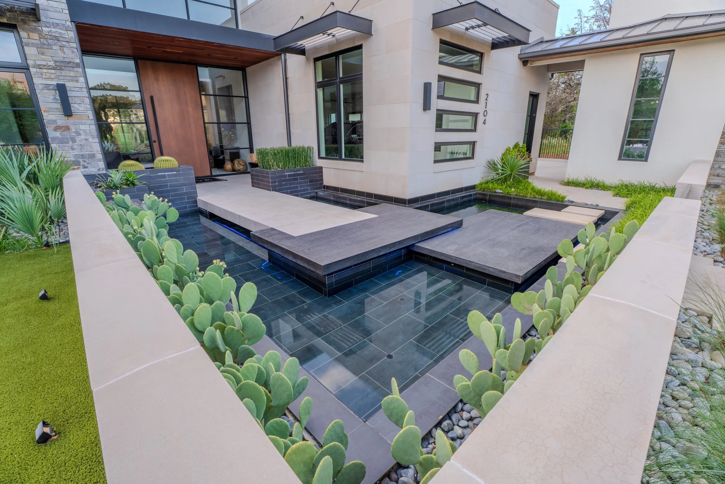travertine and tile on custom fountain in Westlake, TX by Leschber Designs
