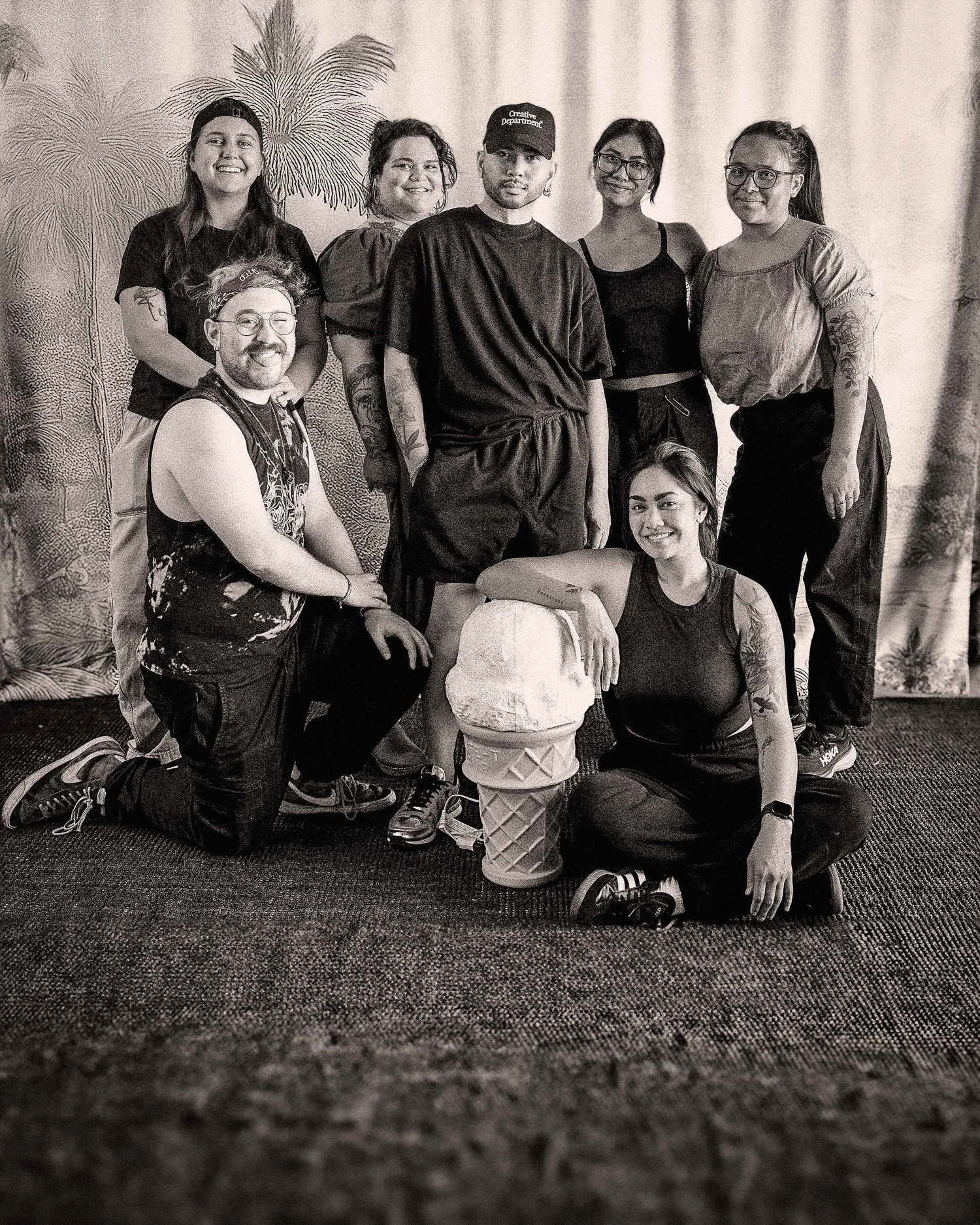 The crew behind DIWA's Prologue editorial, gathered on set