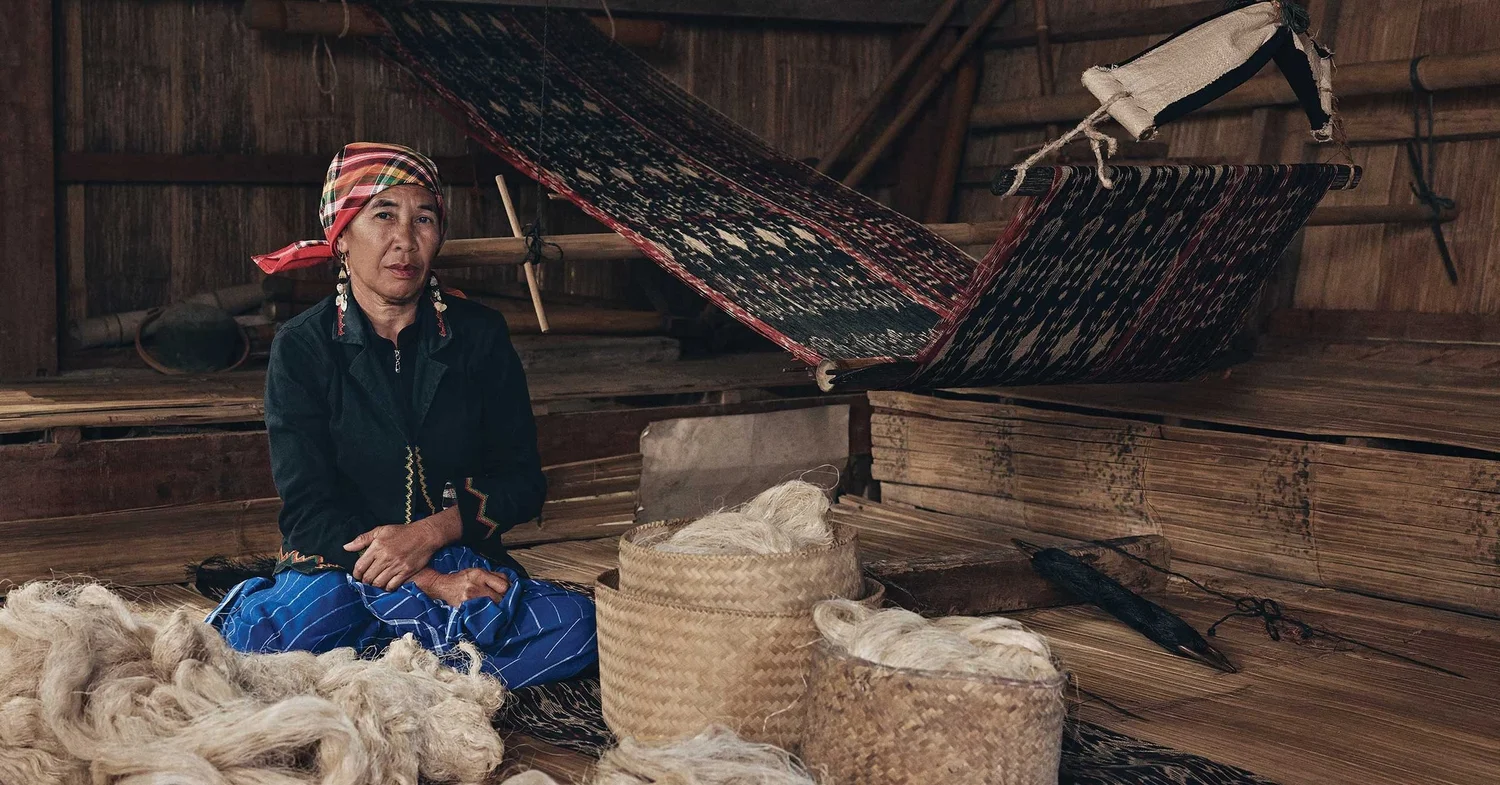 A T’boli woman seated at a loom in Lake Sebu